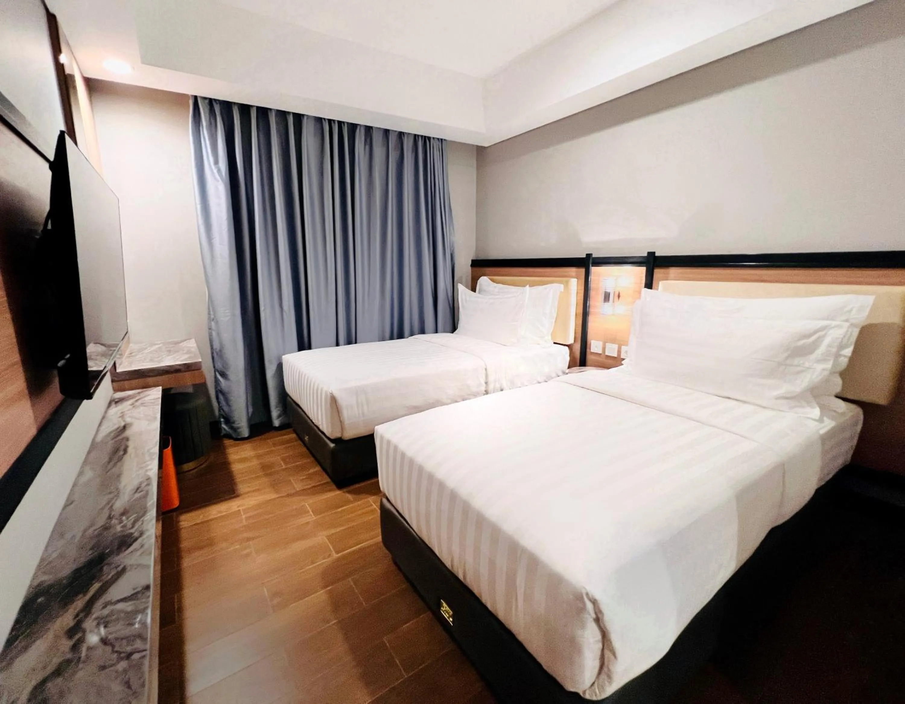 Bedroom, Bed in d'primahotel Airport Sultan Hasanuddin Makassar