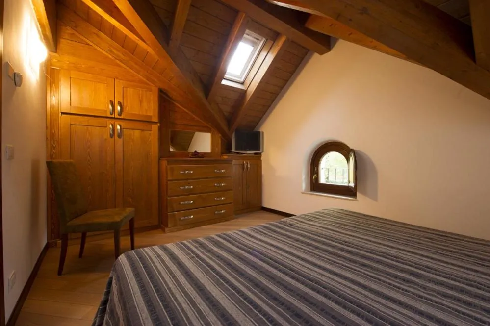 Bed in Albergo Villino Quintiliani