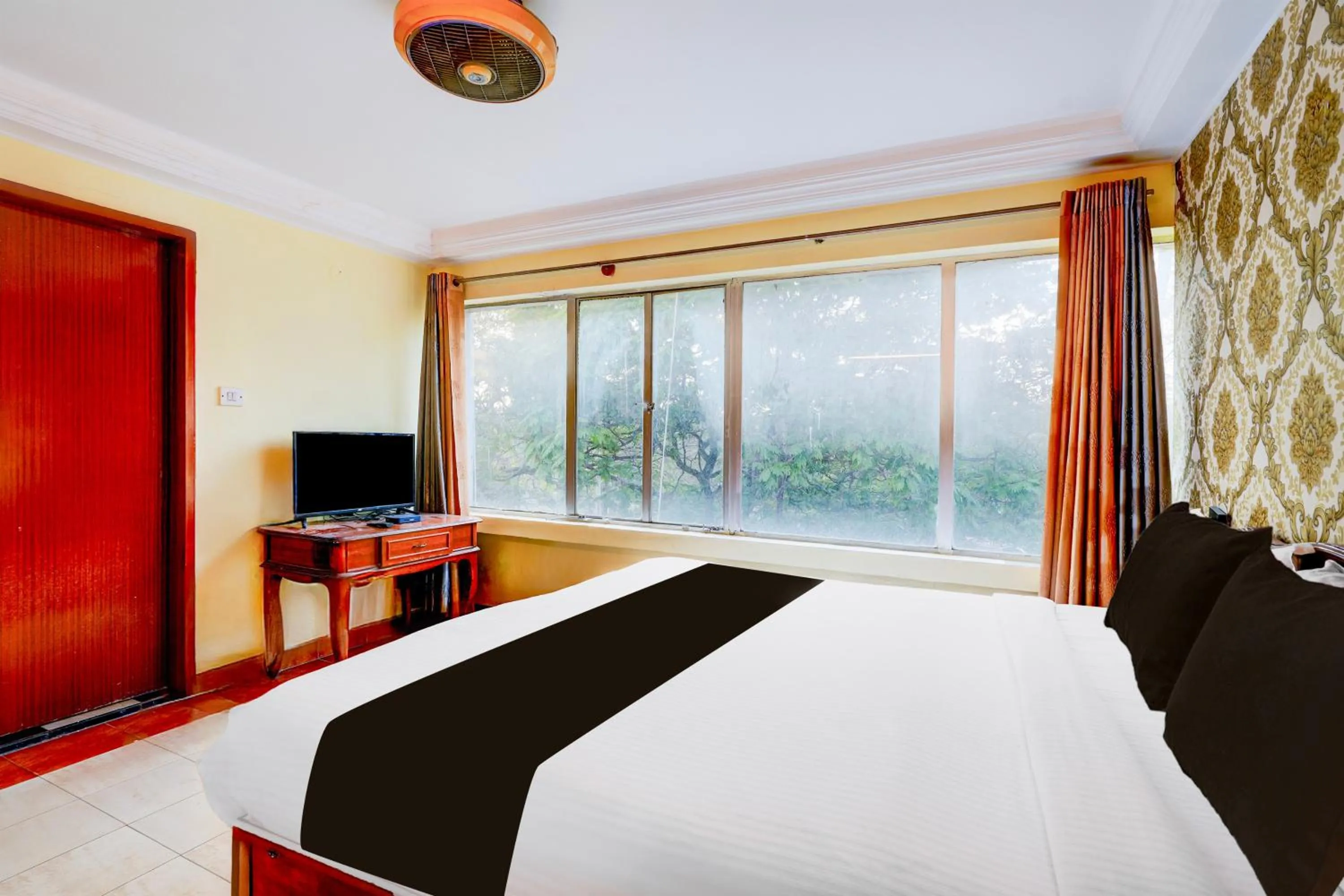 Bedroom, Bed in Super Townhouse Mysore Central Formerly Olive Star