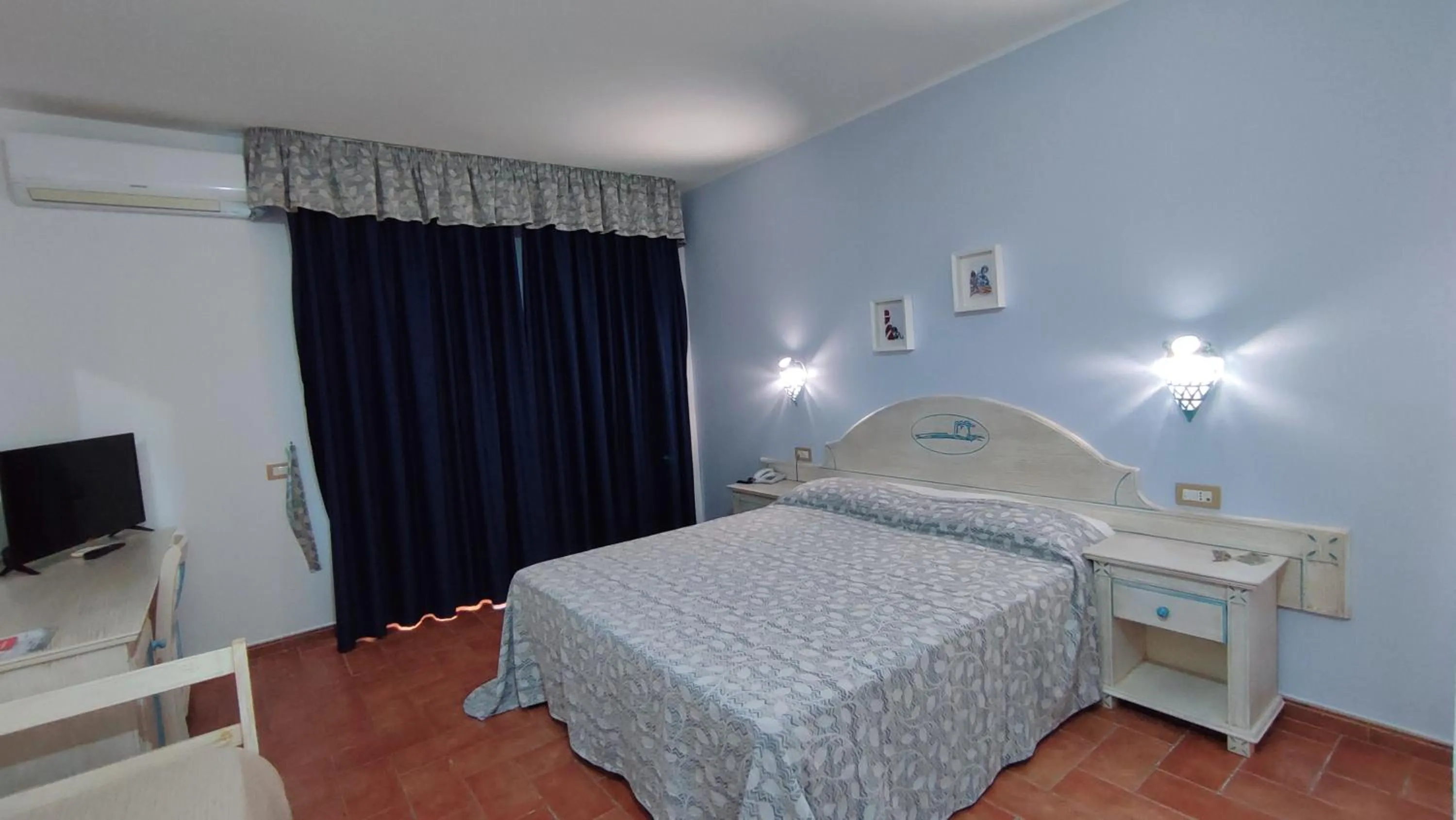 Bed in Hotel le Sabbie