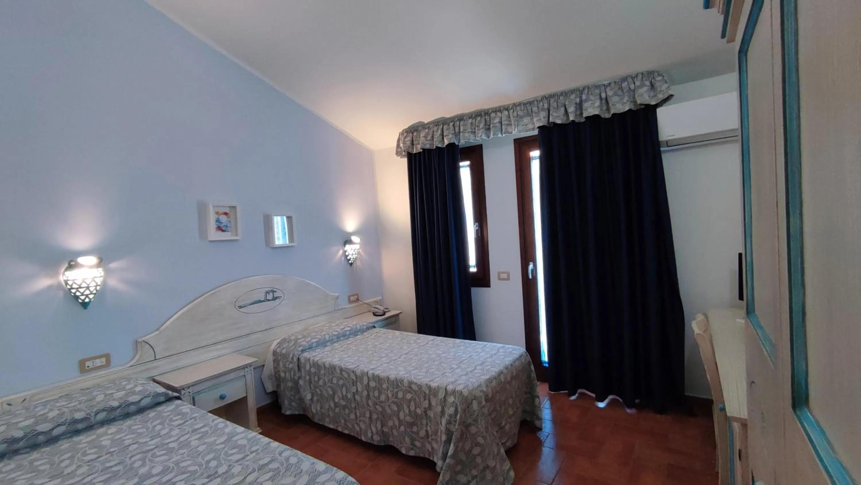 Bed in Hotel le Sabbie