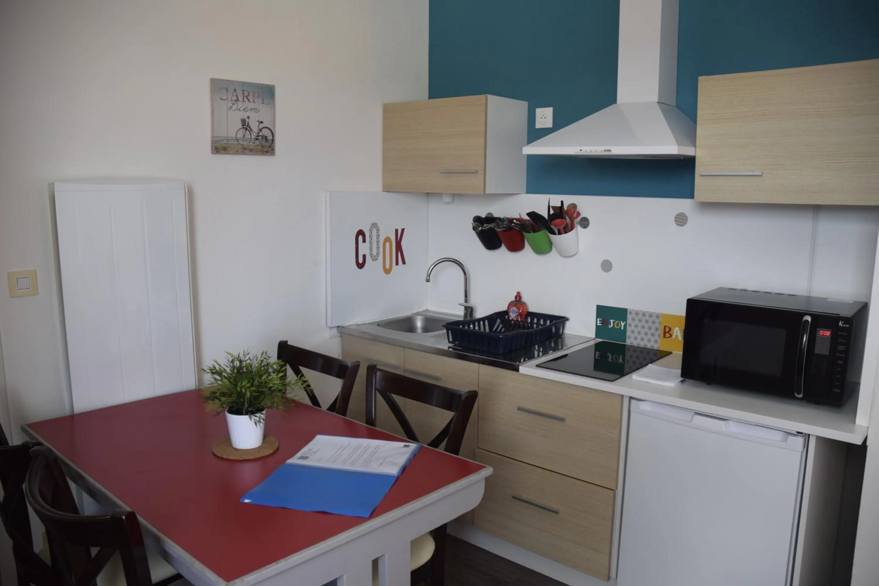 Kitchen or kitchenette in Appart-alma