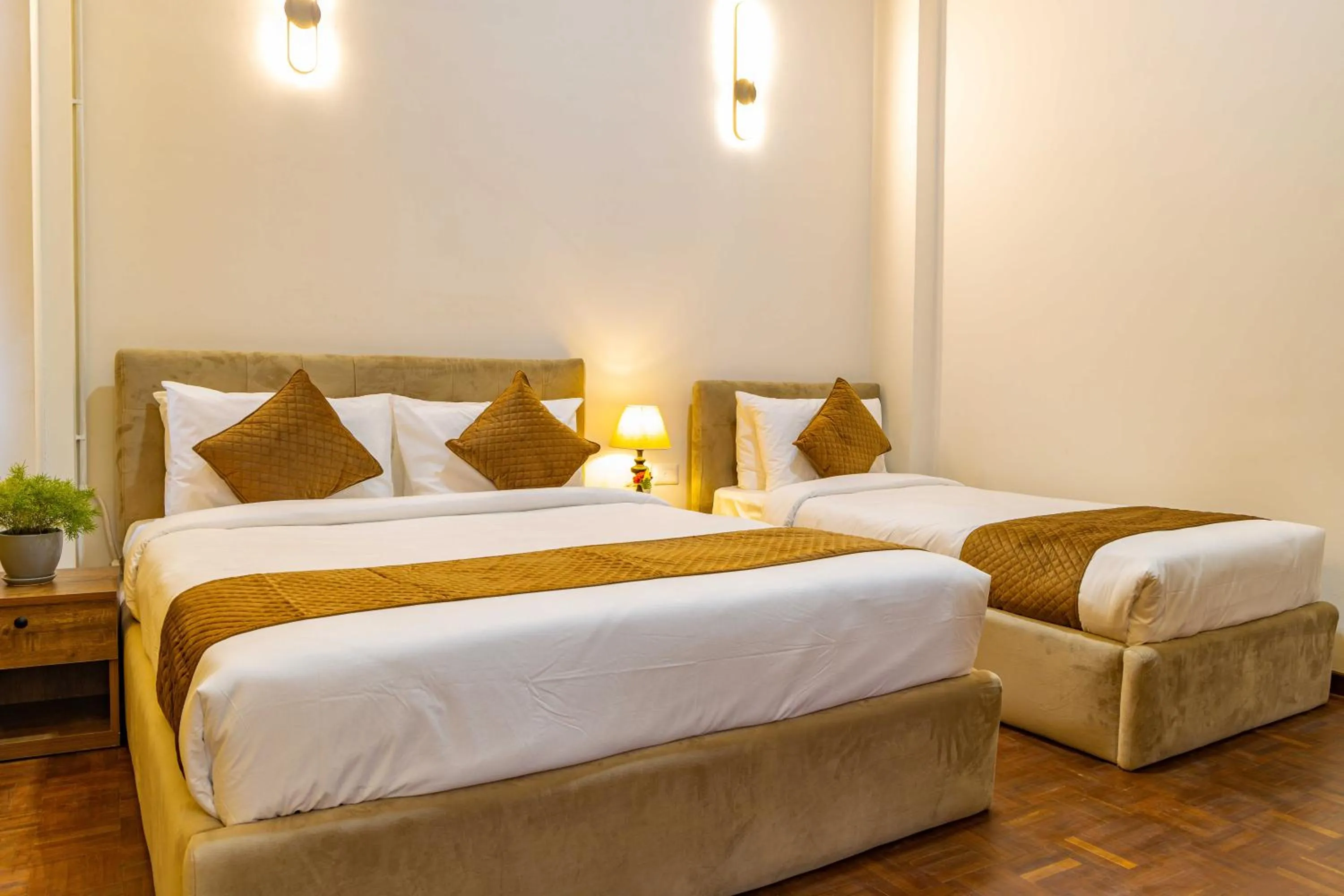 Photo of the whole room, Bed in Mhendo Hotel & Studio Suites