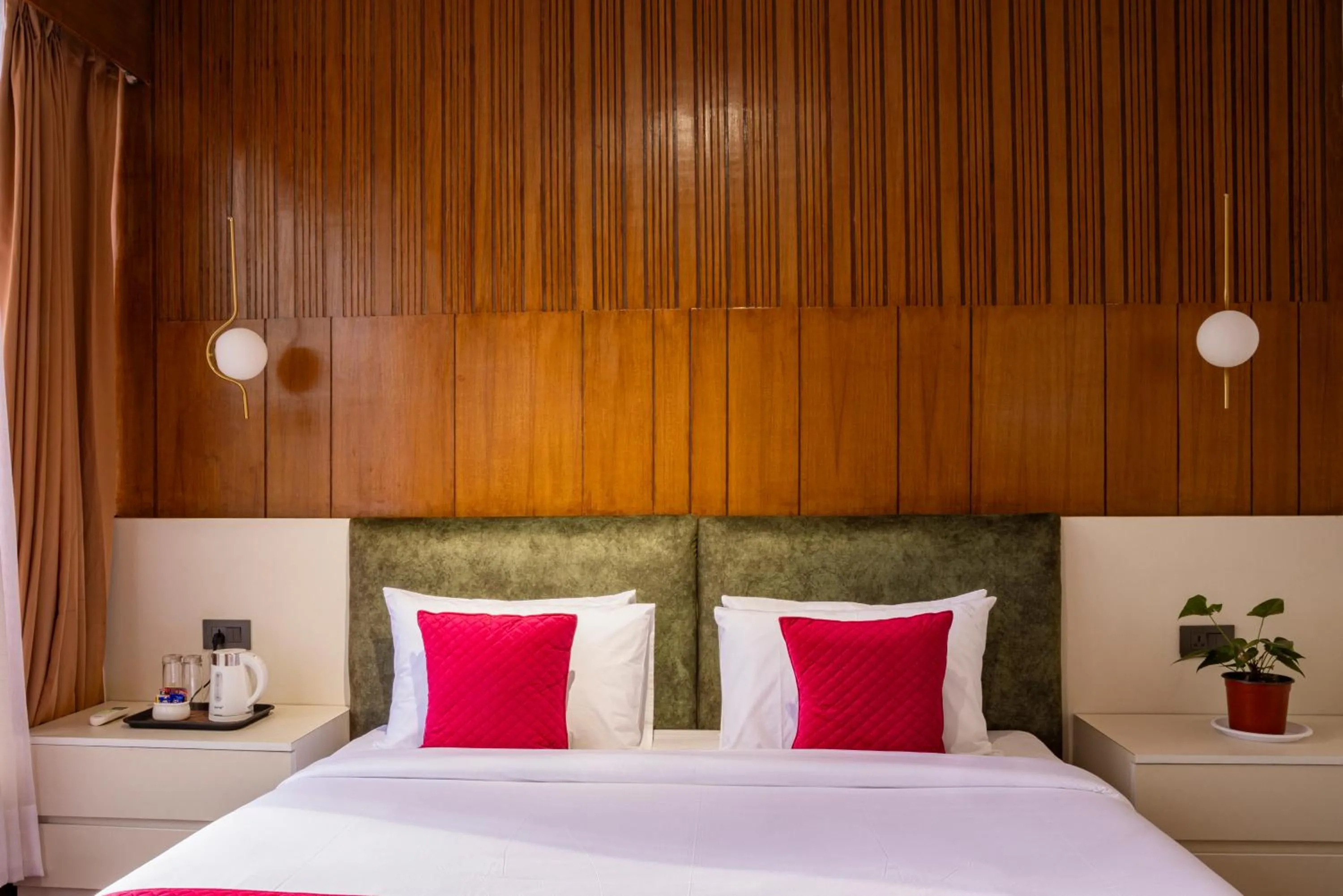 Bed in Mhendo Hotel & Studio Suites