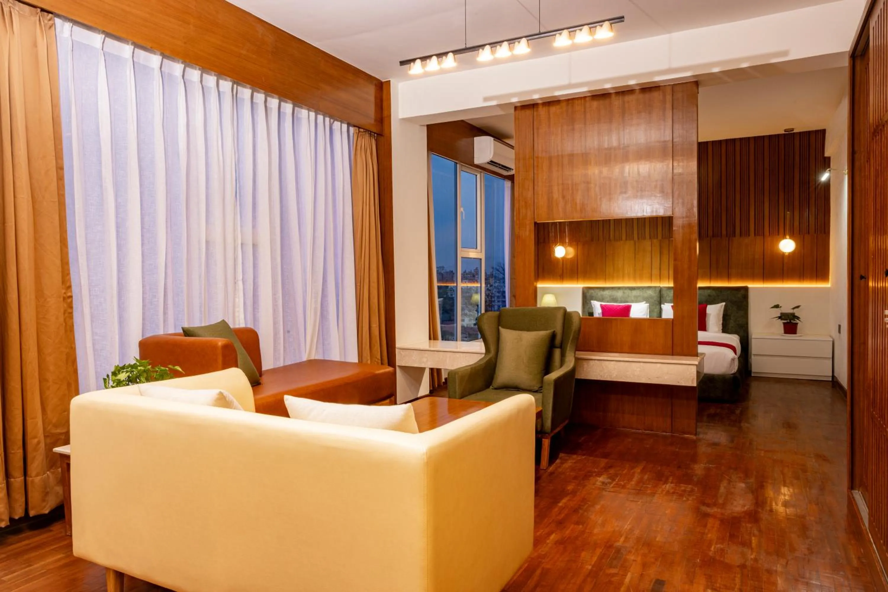 Living room, Bed in Mhendo Hotel & Studio Suites