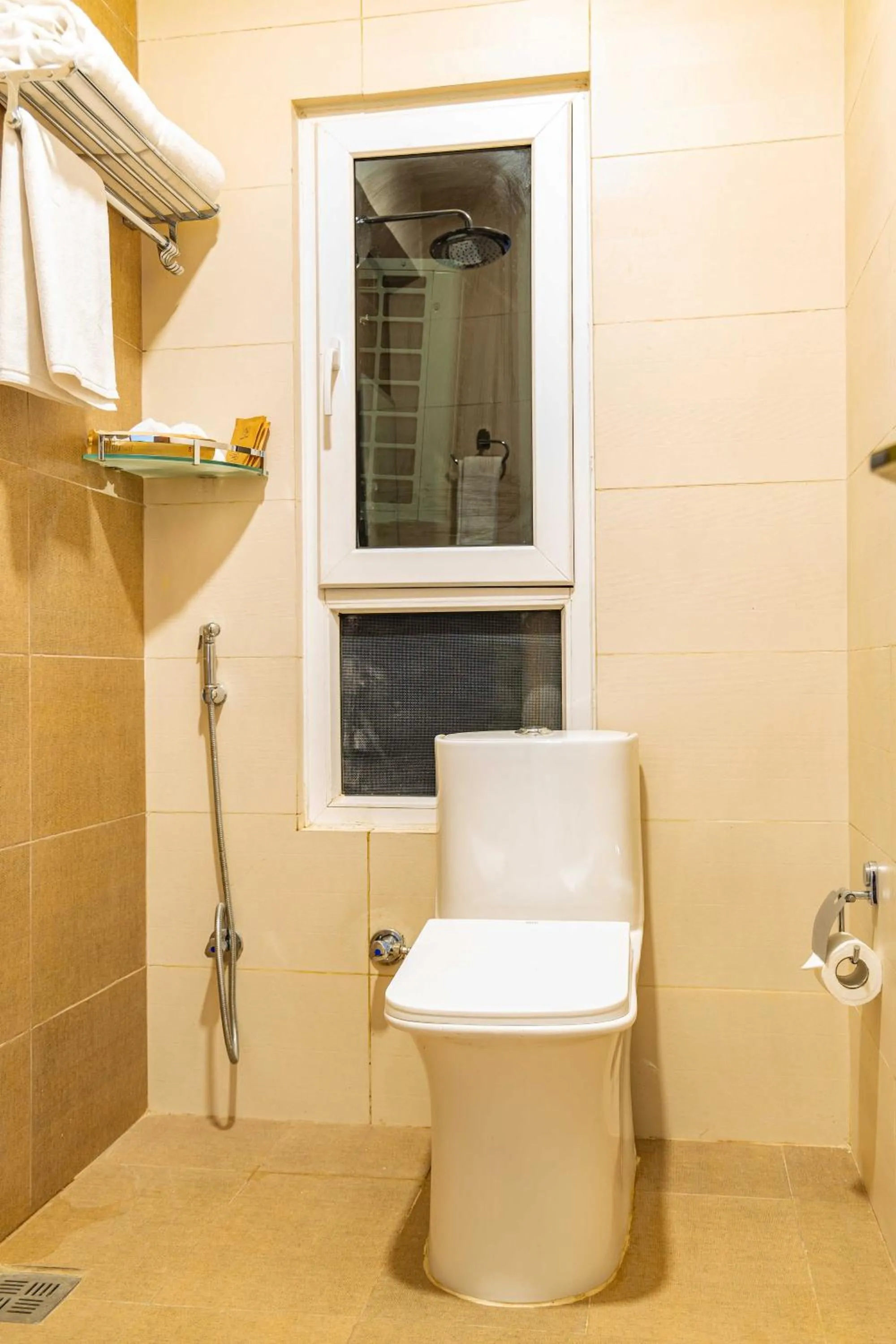 Toilet in Mhendo Hotel & Studio Suites