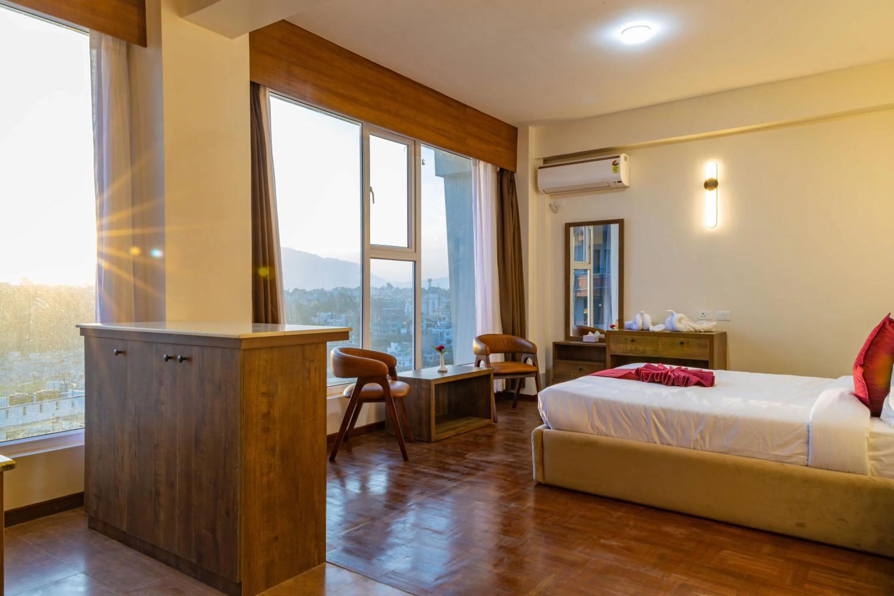 Photo of the whole room, Bed in Mhendo Hotel & Studio Suites