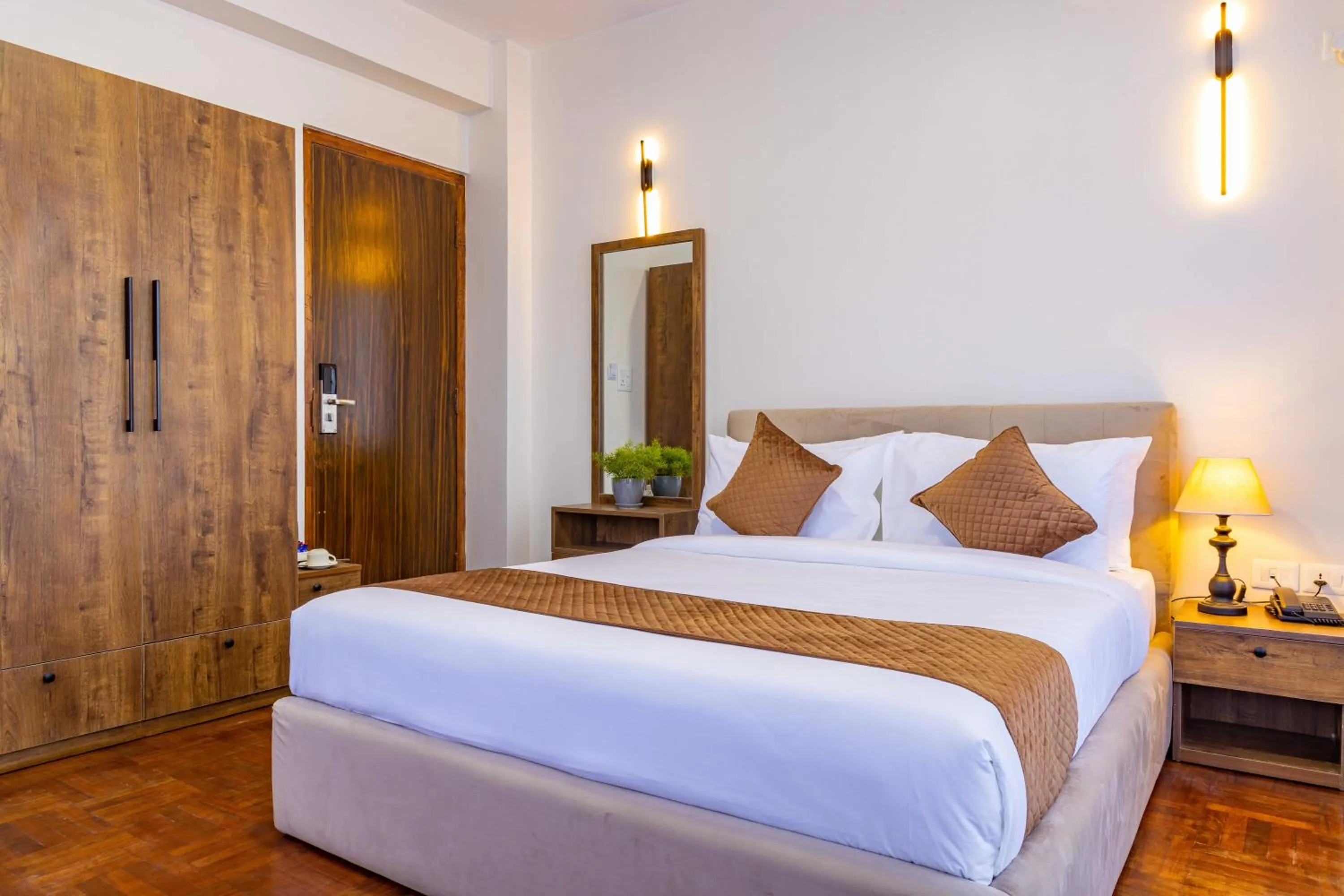 Photo of the whole room, Bed in Mhendo Hotel & Studio Suites