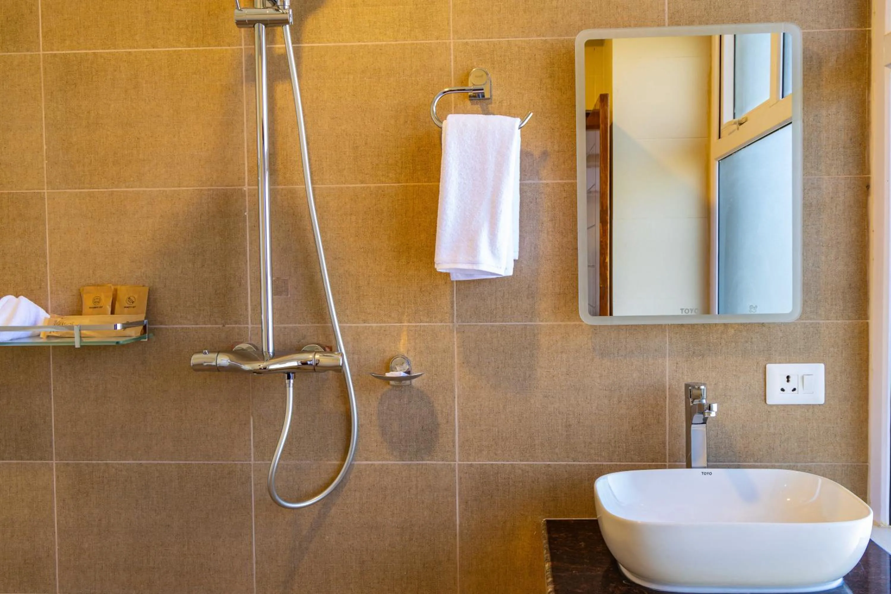 Shower in Mhendo Hotel & Studio Suites
