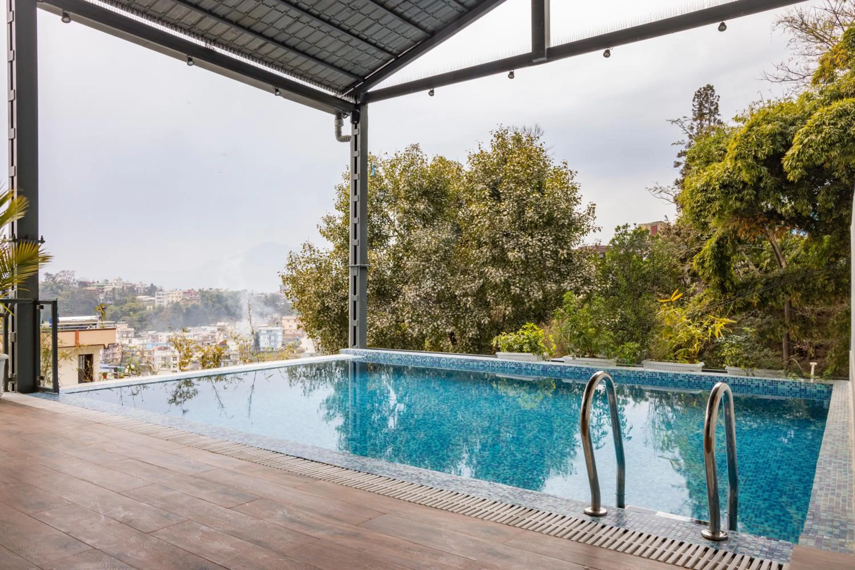 Swimming pool in Mhendo Hotel & Studio Suites