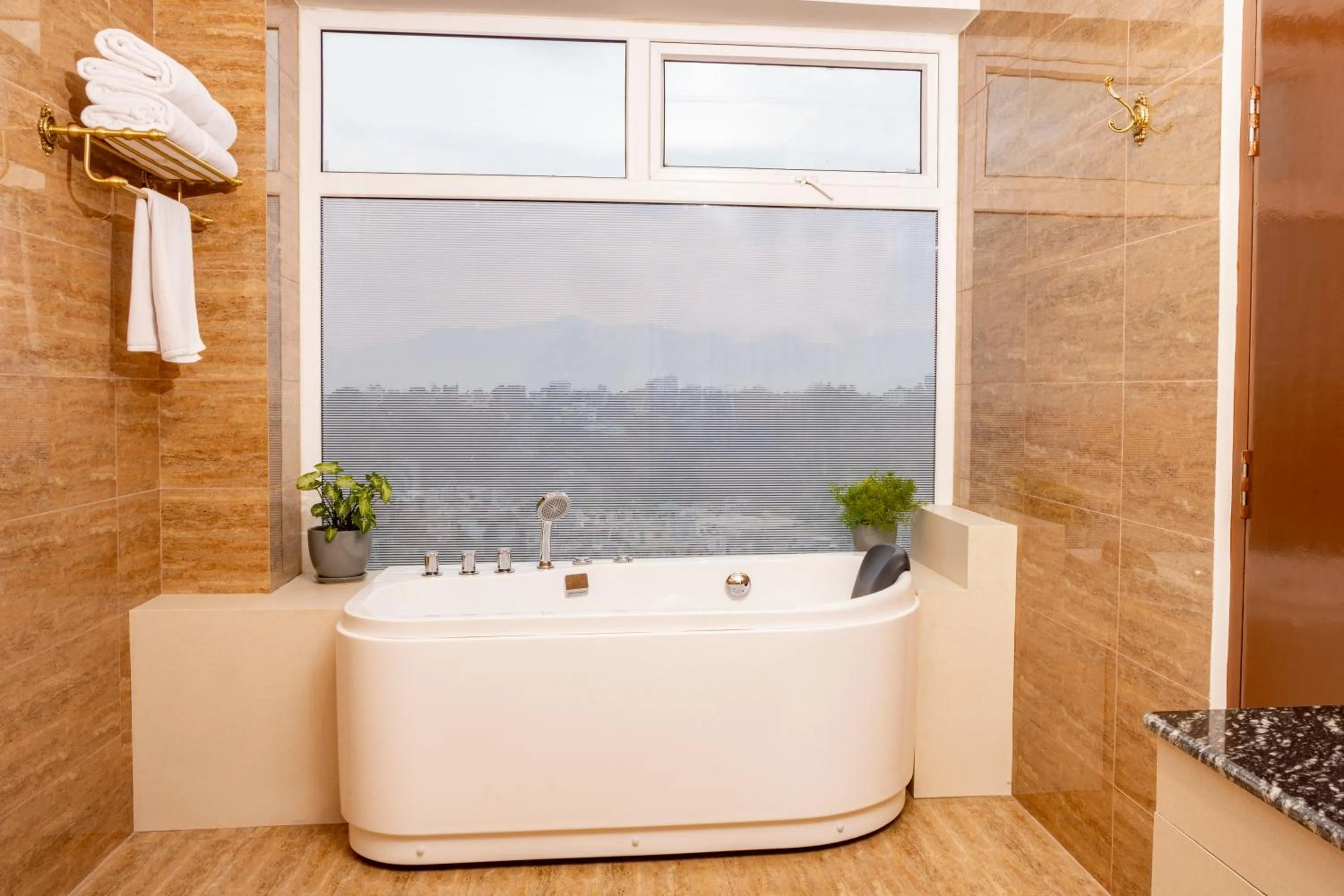 Bathroom in Mhendo Hotel & Studio Suites