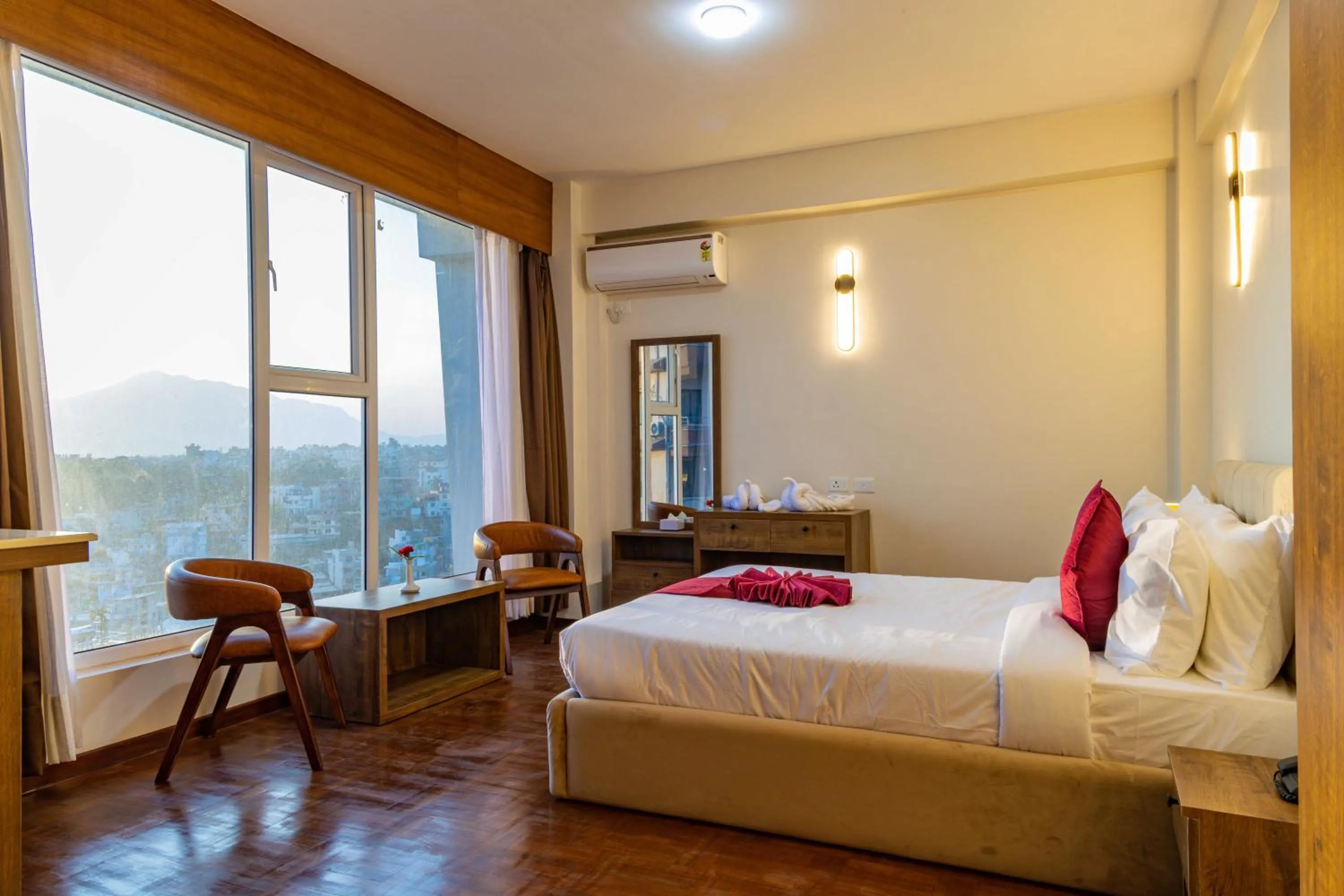 Bed in Mhendo Hotel & Studio Suites