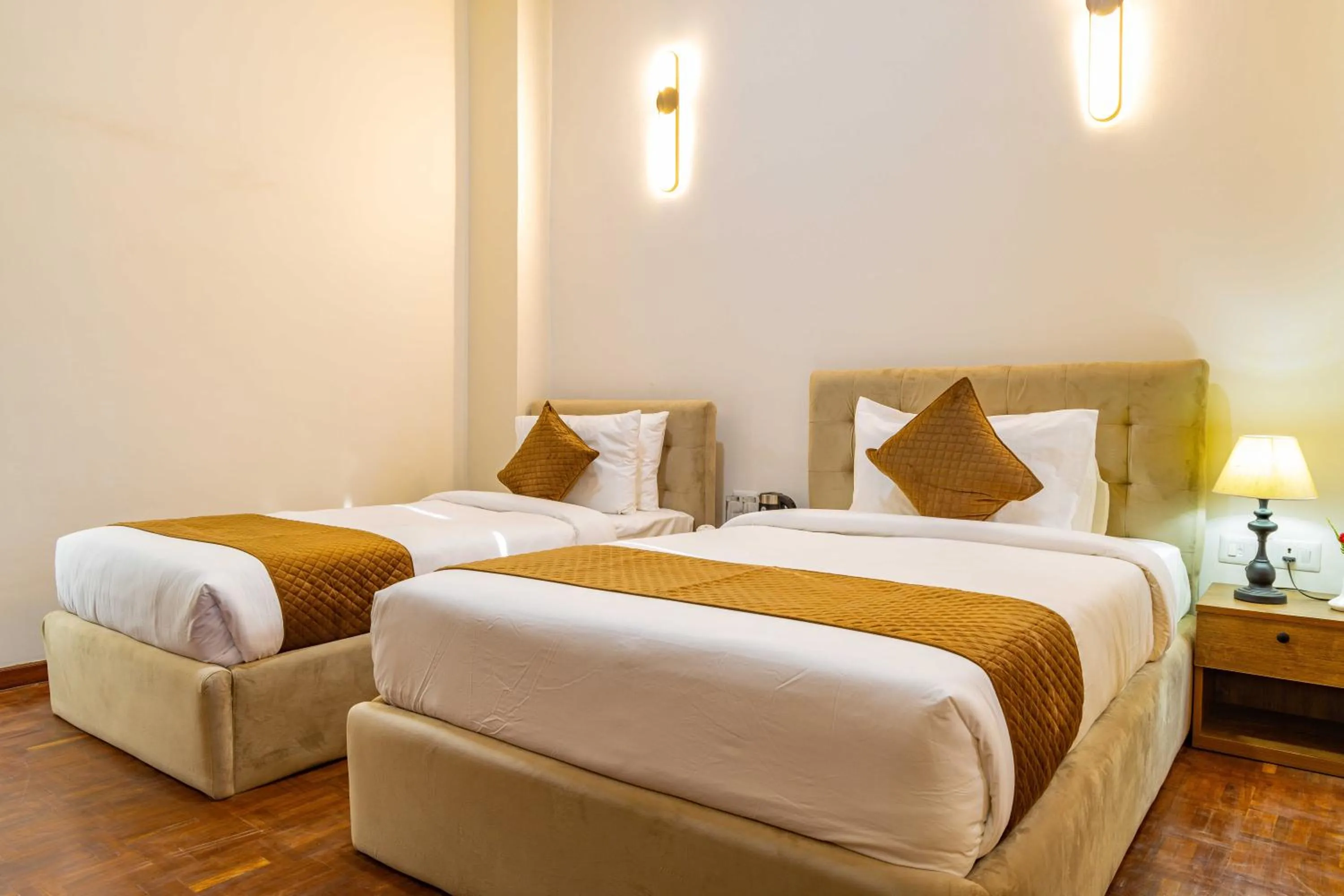 Photo of the whole room, Bed in Mhendo Hotel & Studio Suites