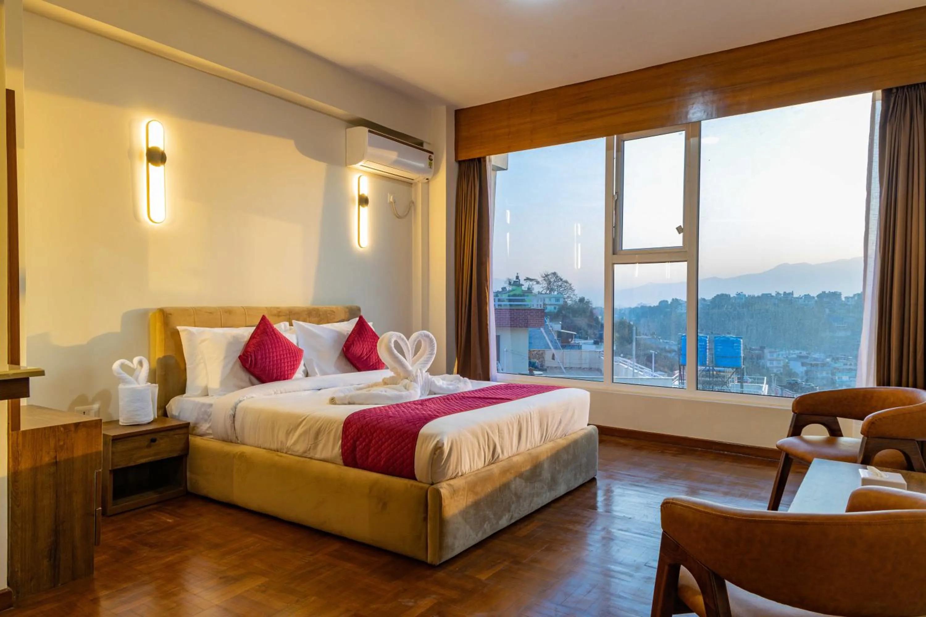 Bed in Mhendo Hotel & Studio Suites