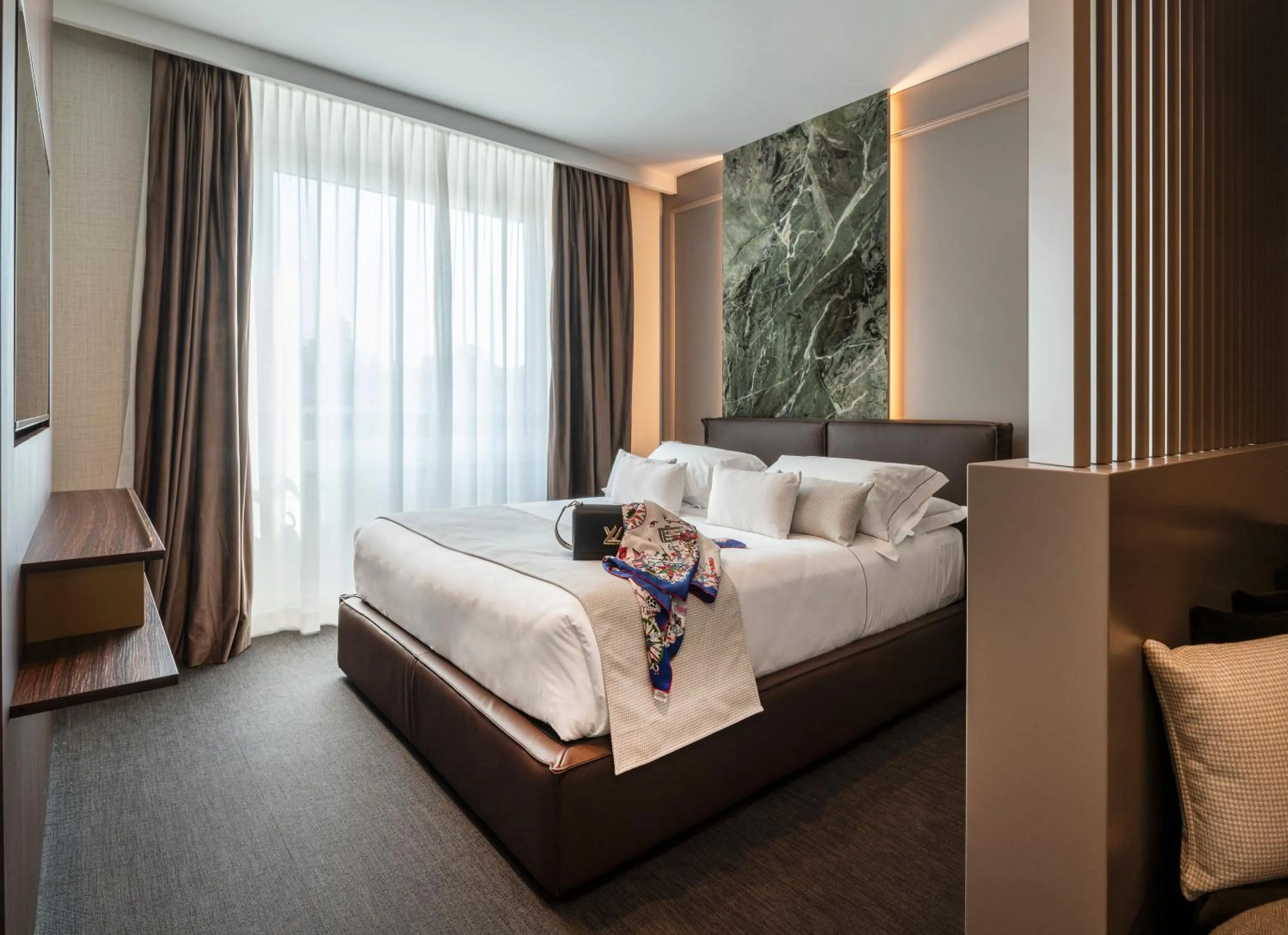 Bed in Duomo Hotel & Apartments