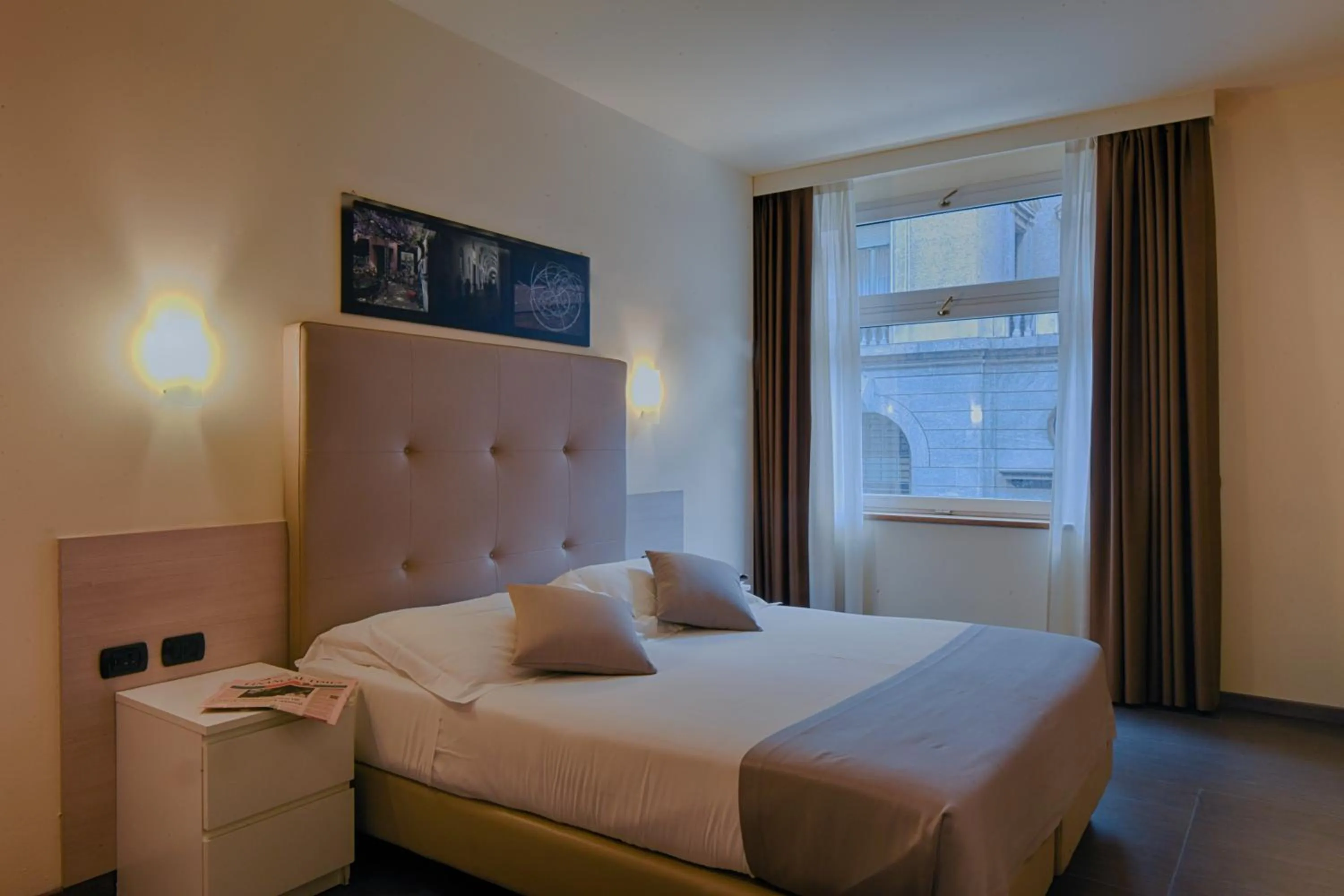 Bed in Duomo Hotel & Apartments