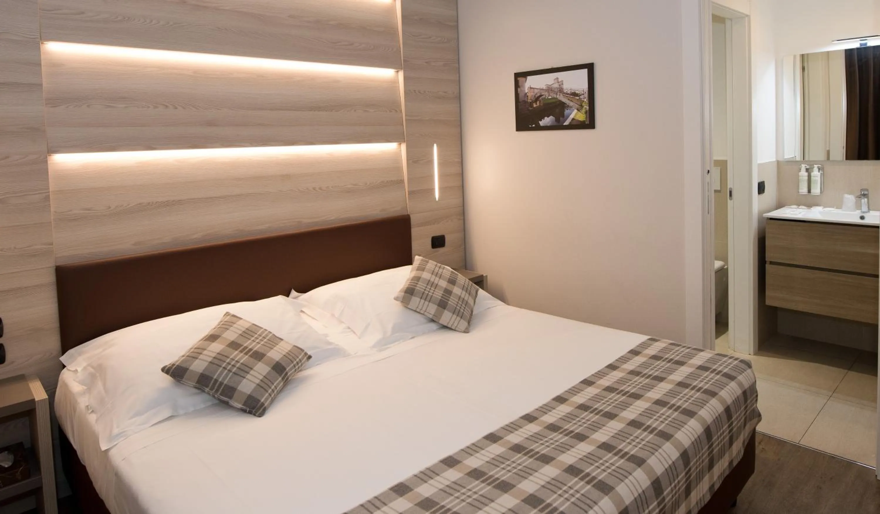 Bed in Duomo Hotel & Apartments