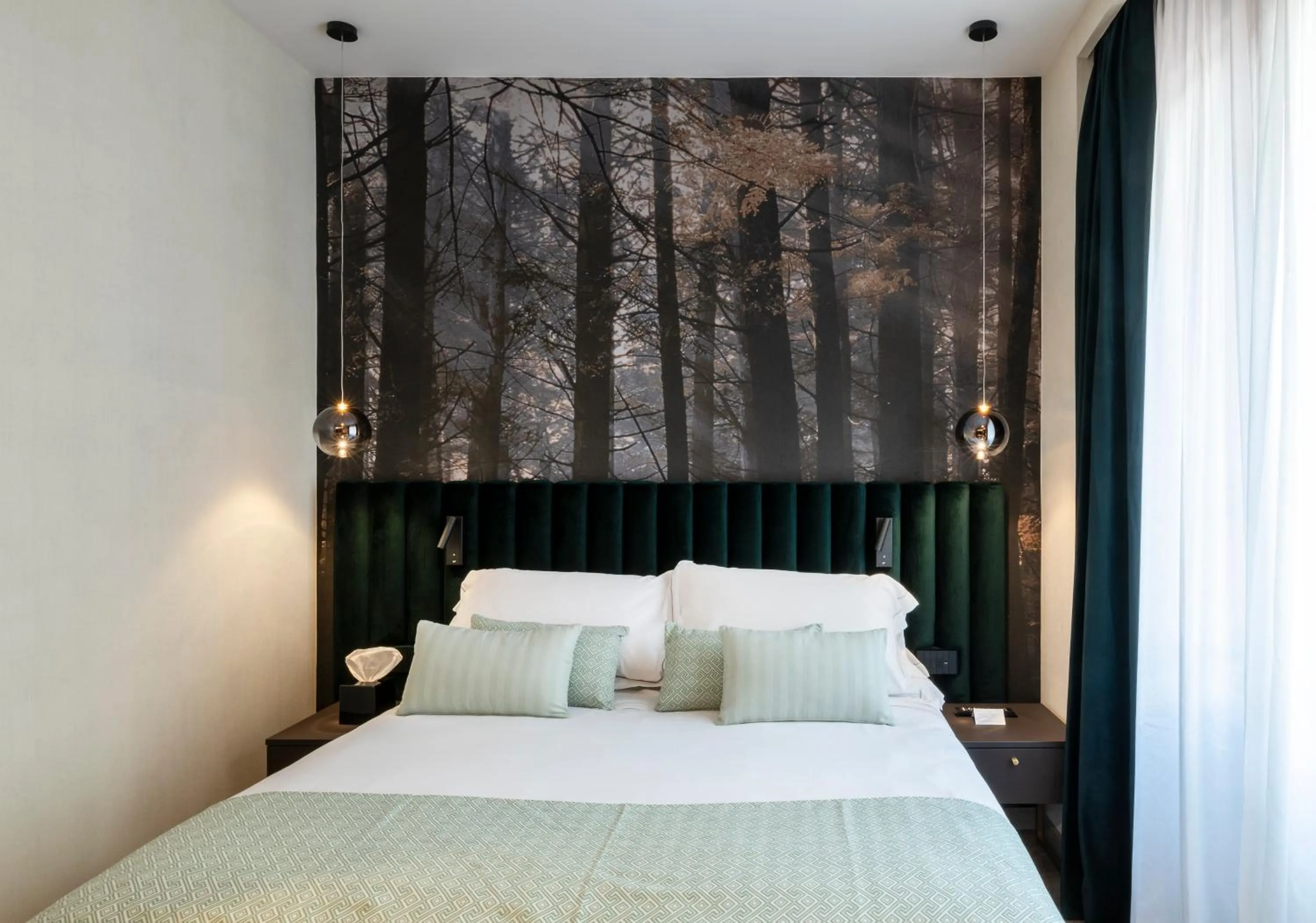 Bed in Duomo Hotel & Apartments