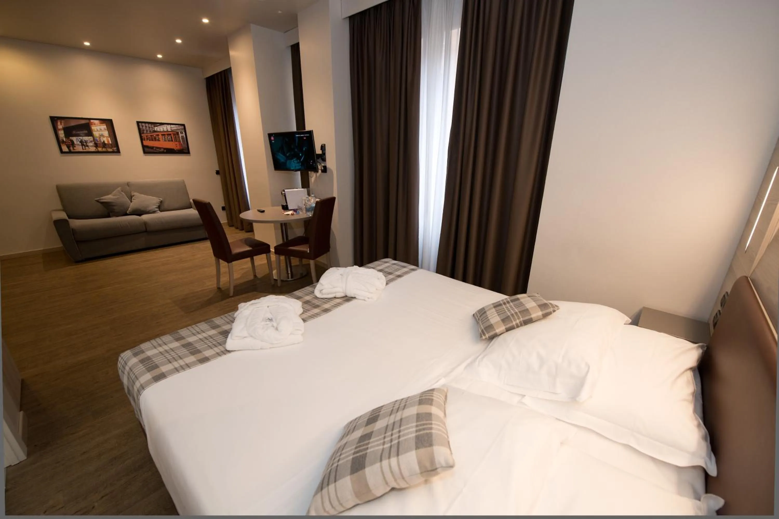 Photo of the whole room, Bed in Duomo Hotel & Apartments