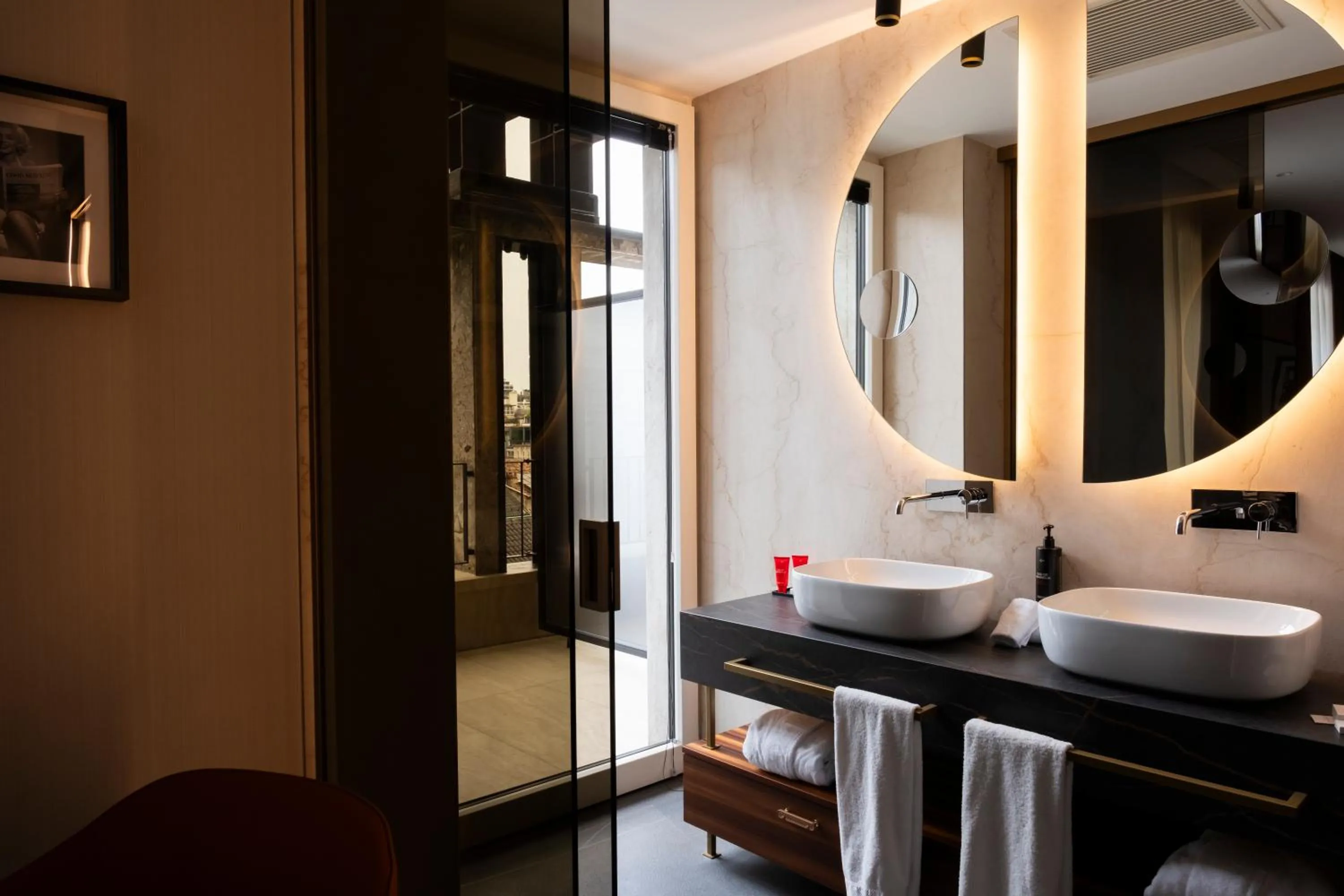 Bathroom in Duomo Hotel & Apartments