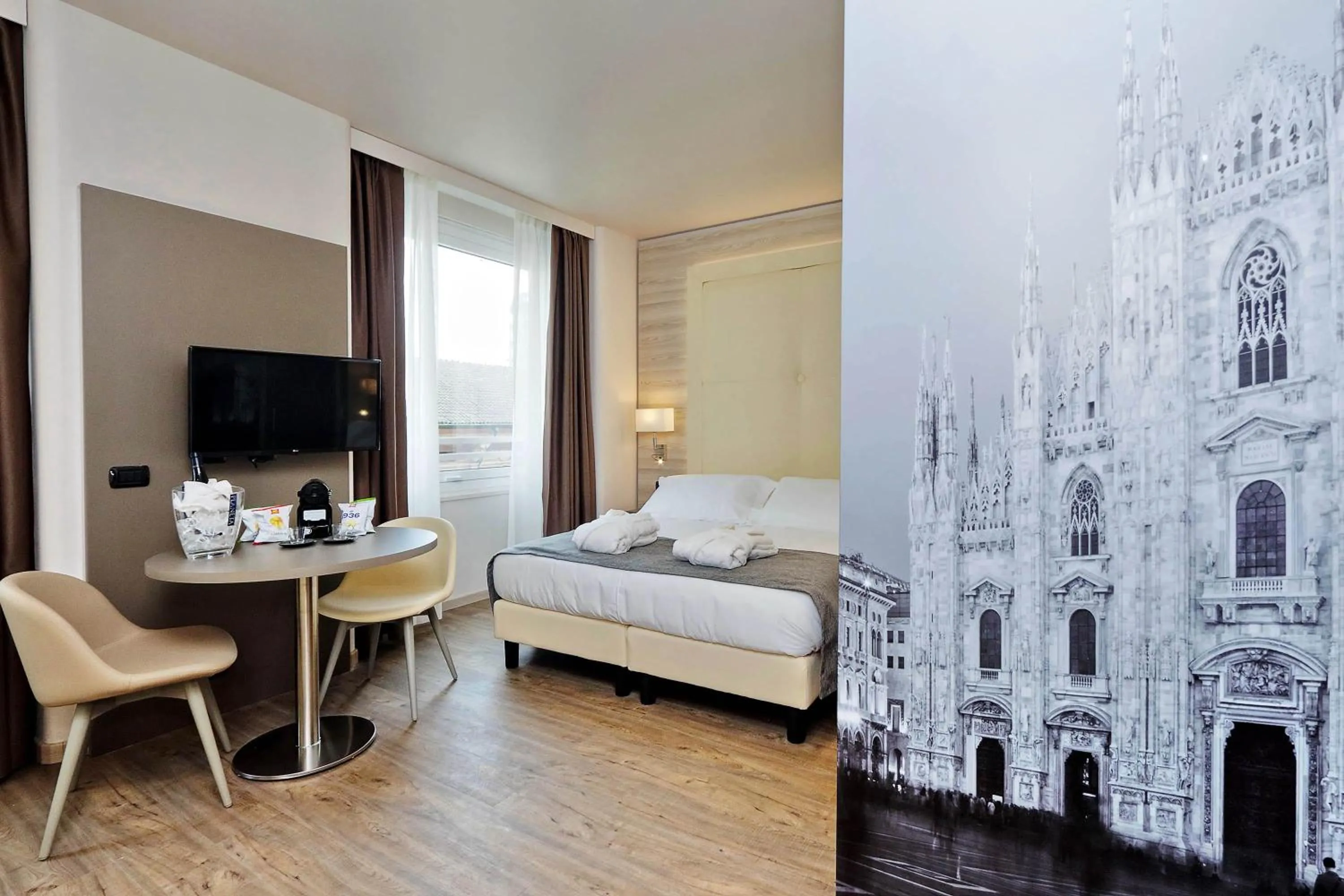 Bed in Duomo Hotel & Apartments
