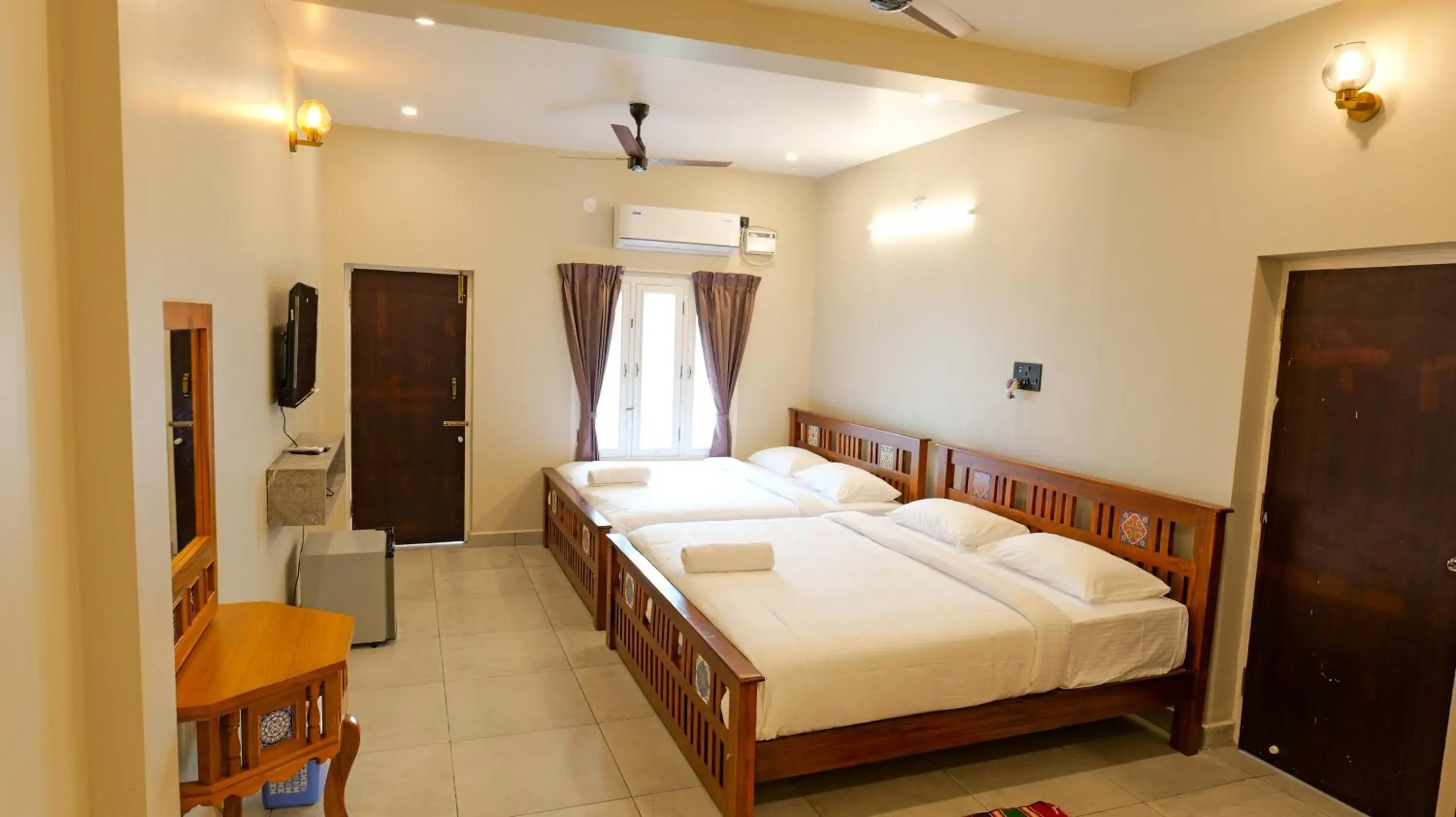 Premium Quadruple Room in Dwaraka Resorts Premium Quadruple Room in Dwaraka Resorts