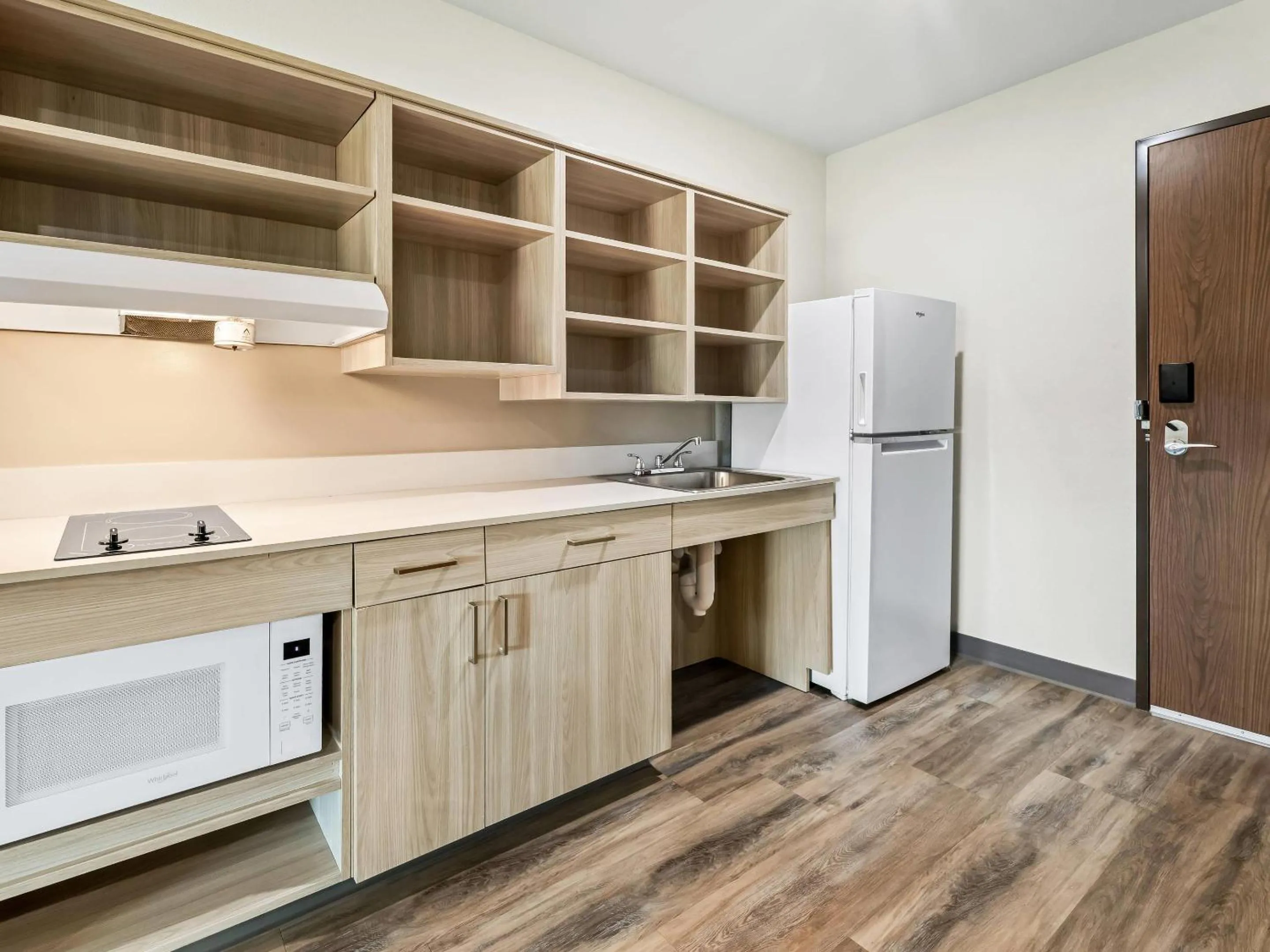 Bedroom in WoodSpring Suites Prattville - Montgomery North