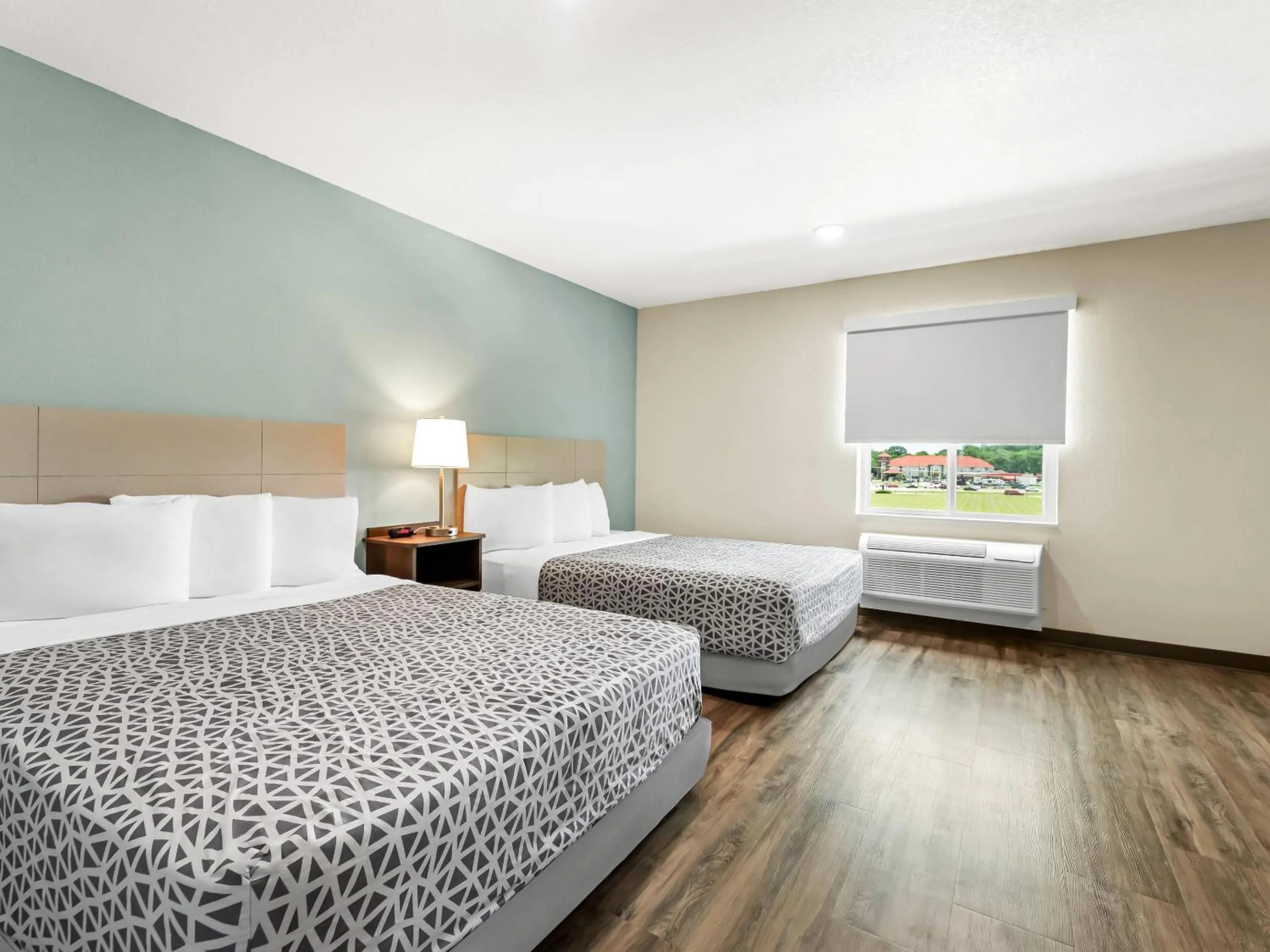 Bedroom, Bed in WoodSpring Suites Prattville - Montgomery North