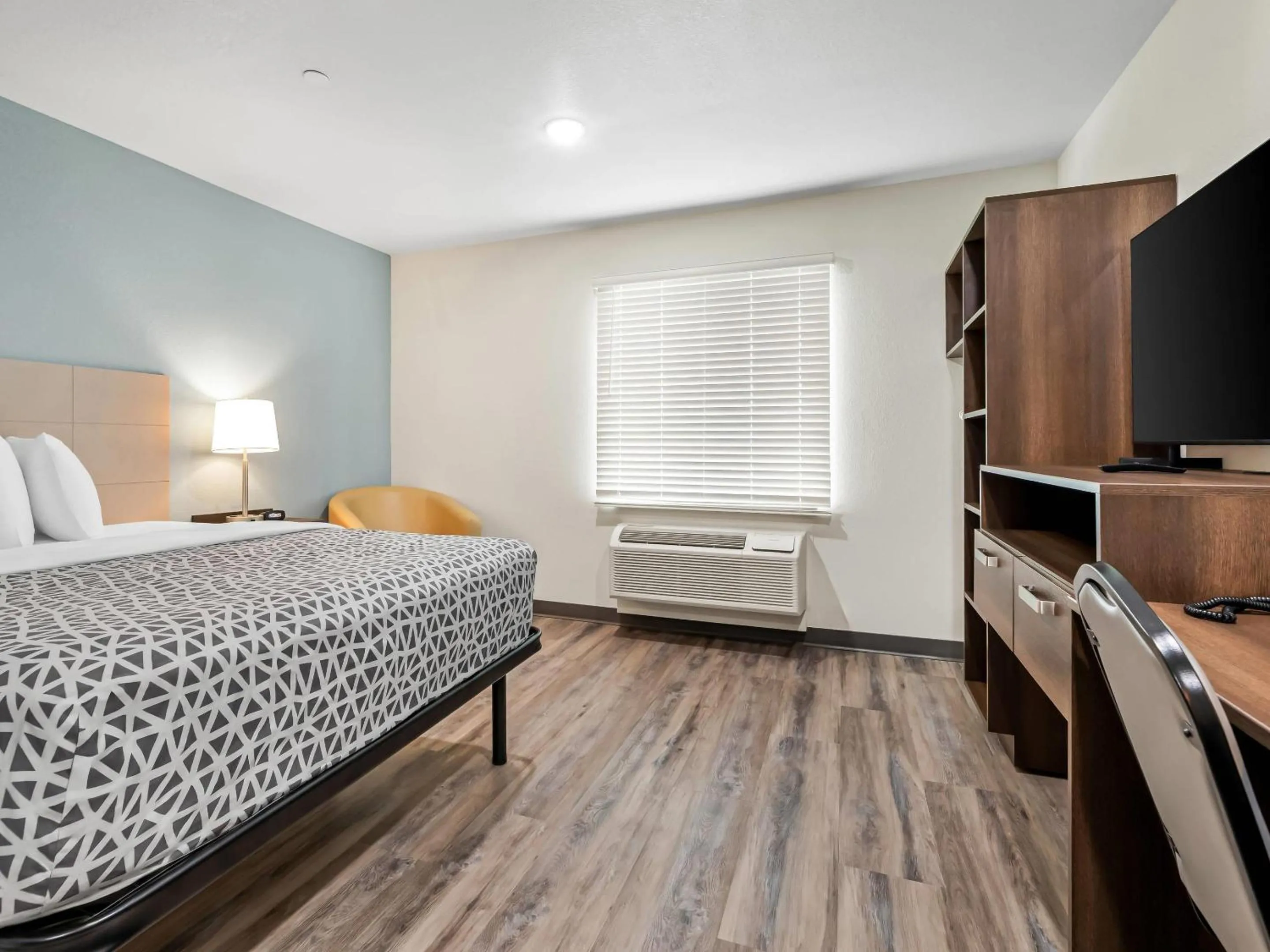 Bedroom, Bed in WoodSpring Suites Prattville - Montgomery North