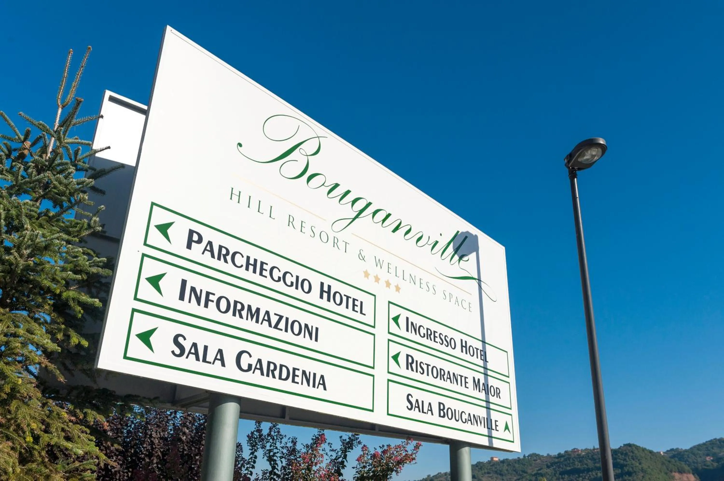 Property logo or sign in Bouganville Hill Resort & Wellness Space