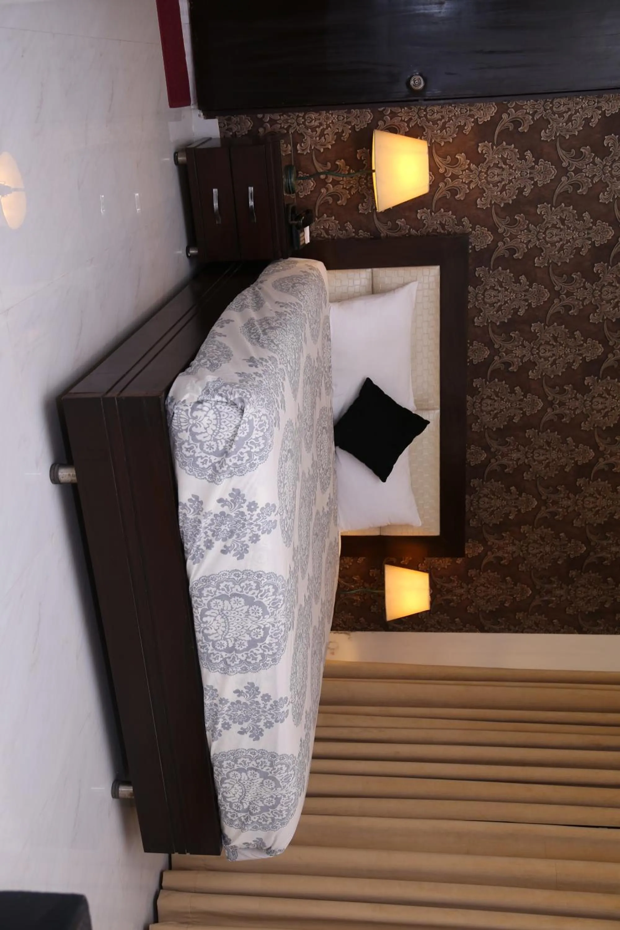 Bed in Royal Elegance Hotel