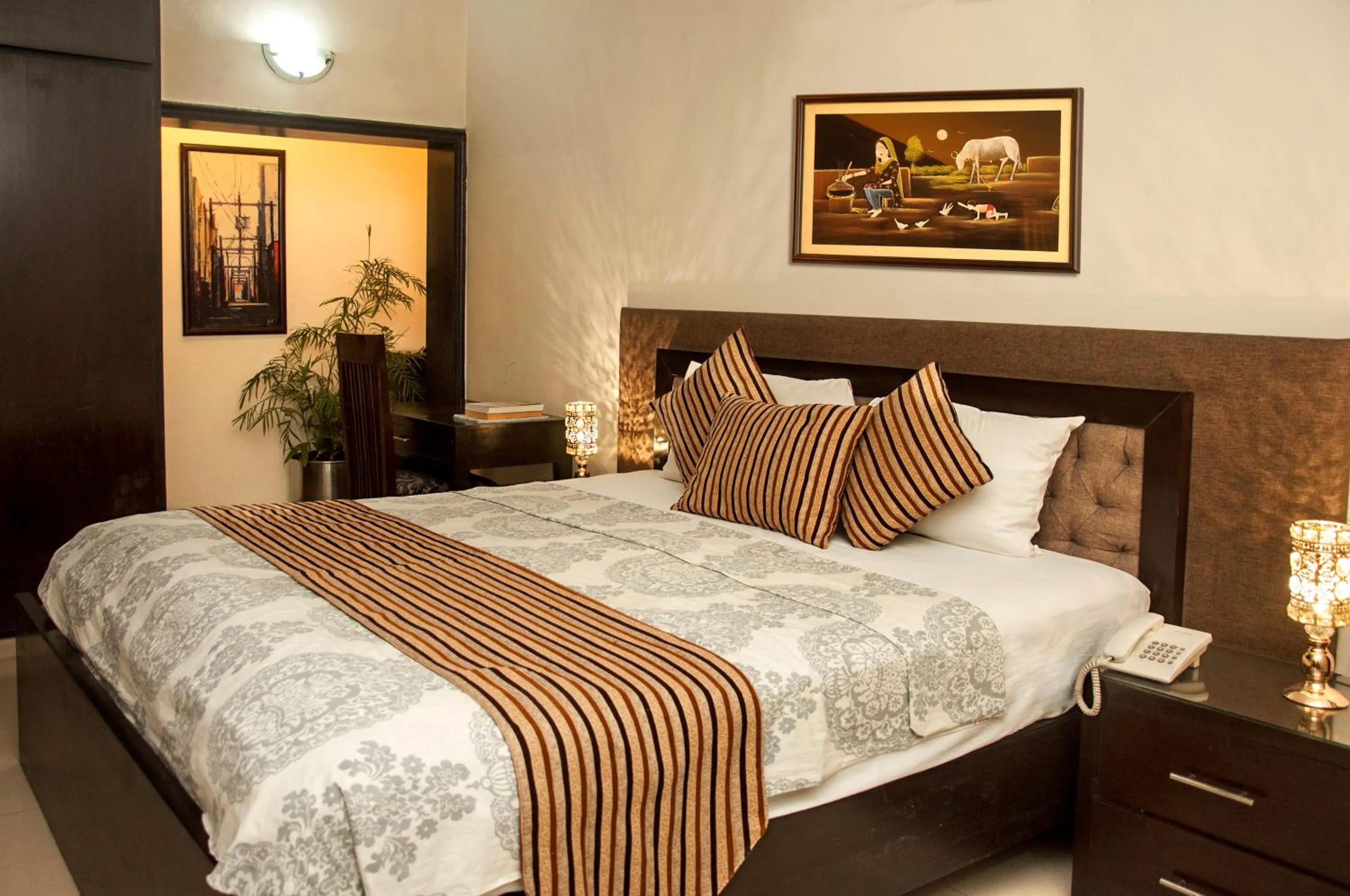 Bed in Royal Elegance Hotel