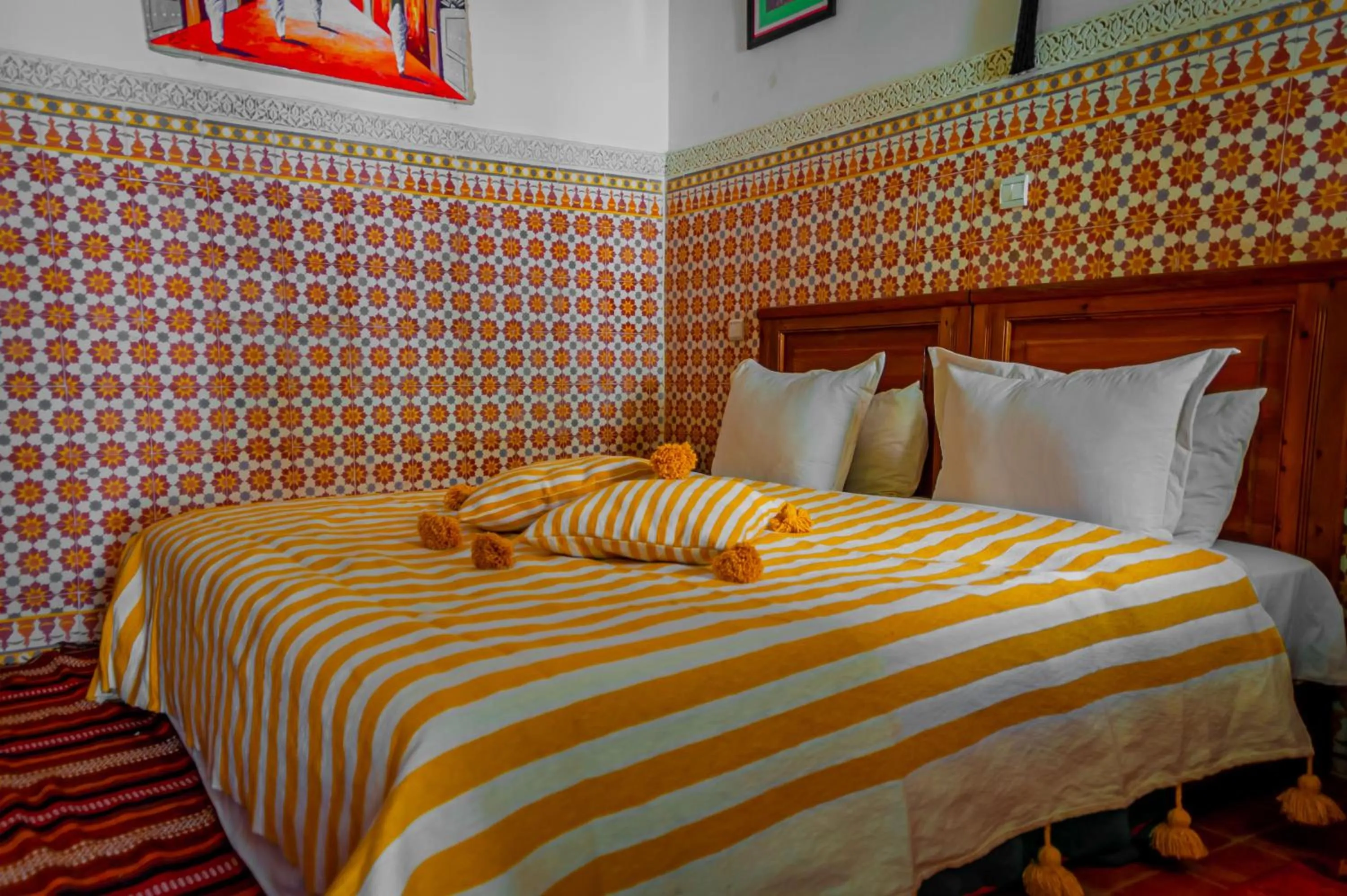 Bed in Riad Dar Mamouni