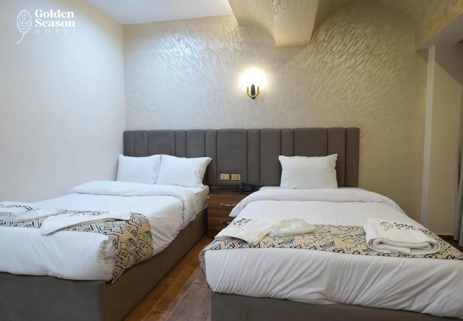 Bed in Golden Season Hotel