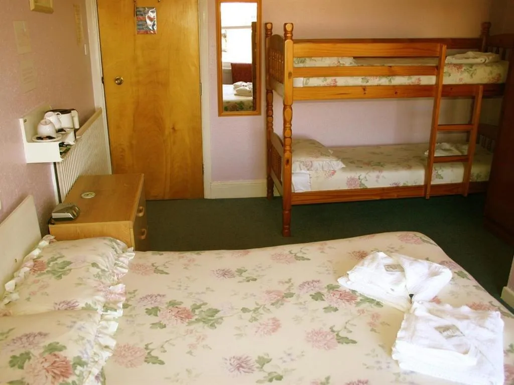 Bed in Cherry Tree Hotel