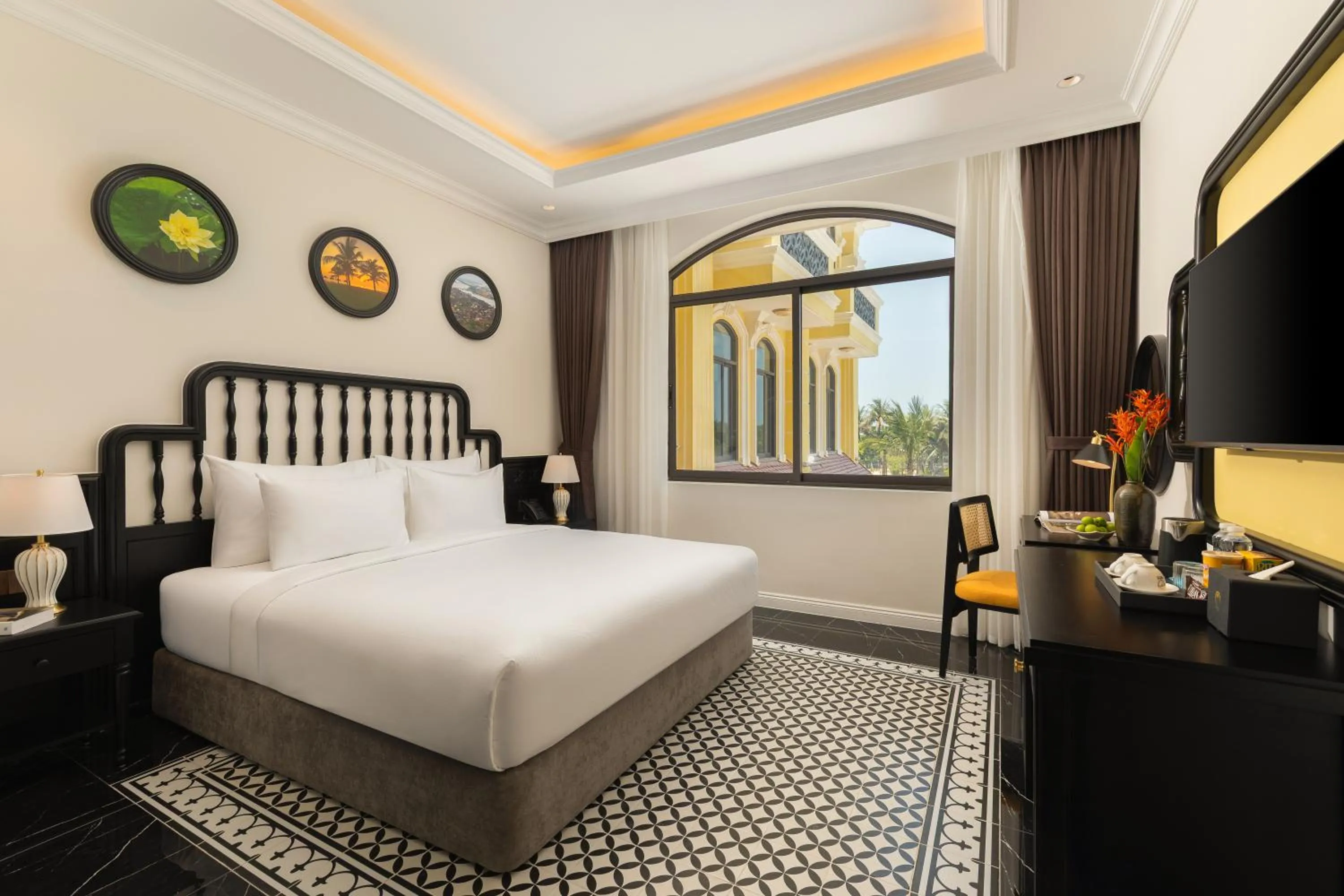 Bed in Nesta Hoian Resort & Spa