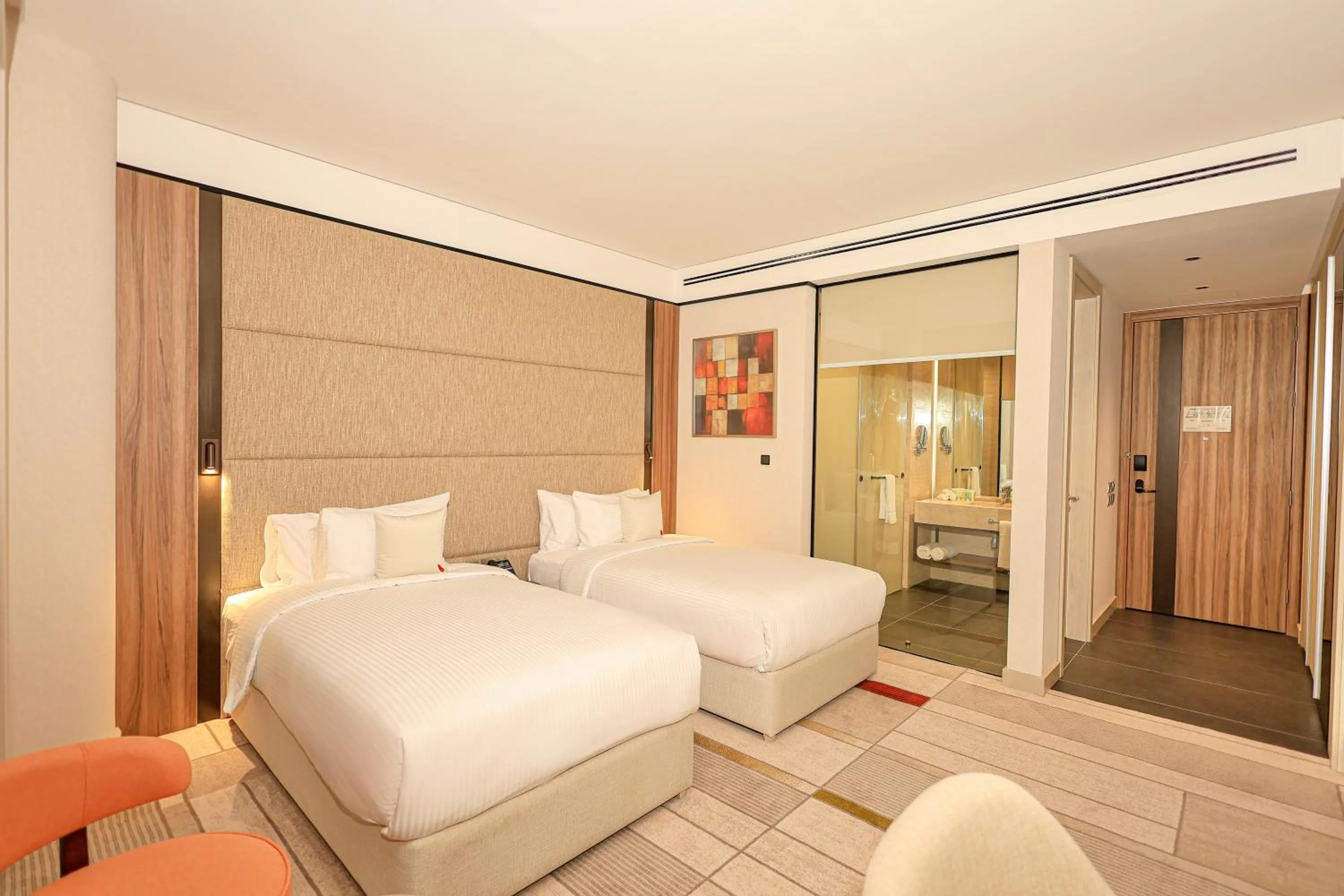 Bed in Swisstouches Hotel Amman