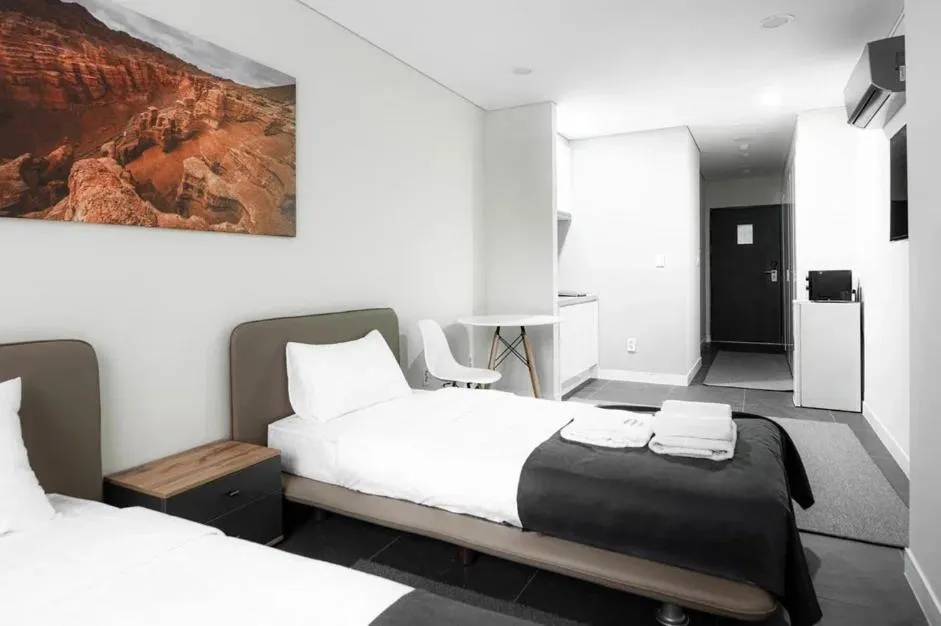 Bed in HIGHVILL Hotel by AG Hotels Group
