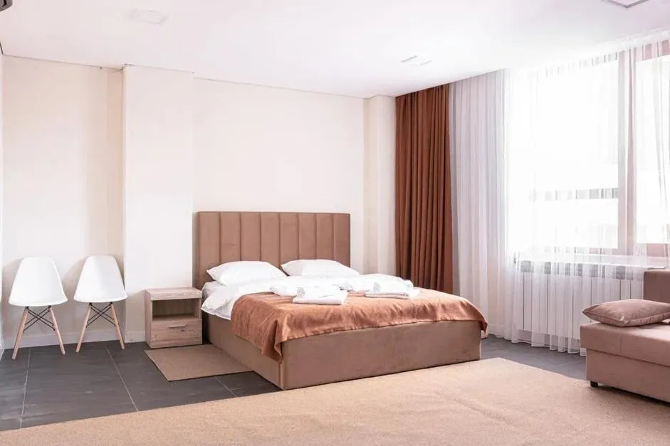 Living room, Bed in HIGHVILL Hotel by AG Hotels Group