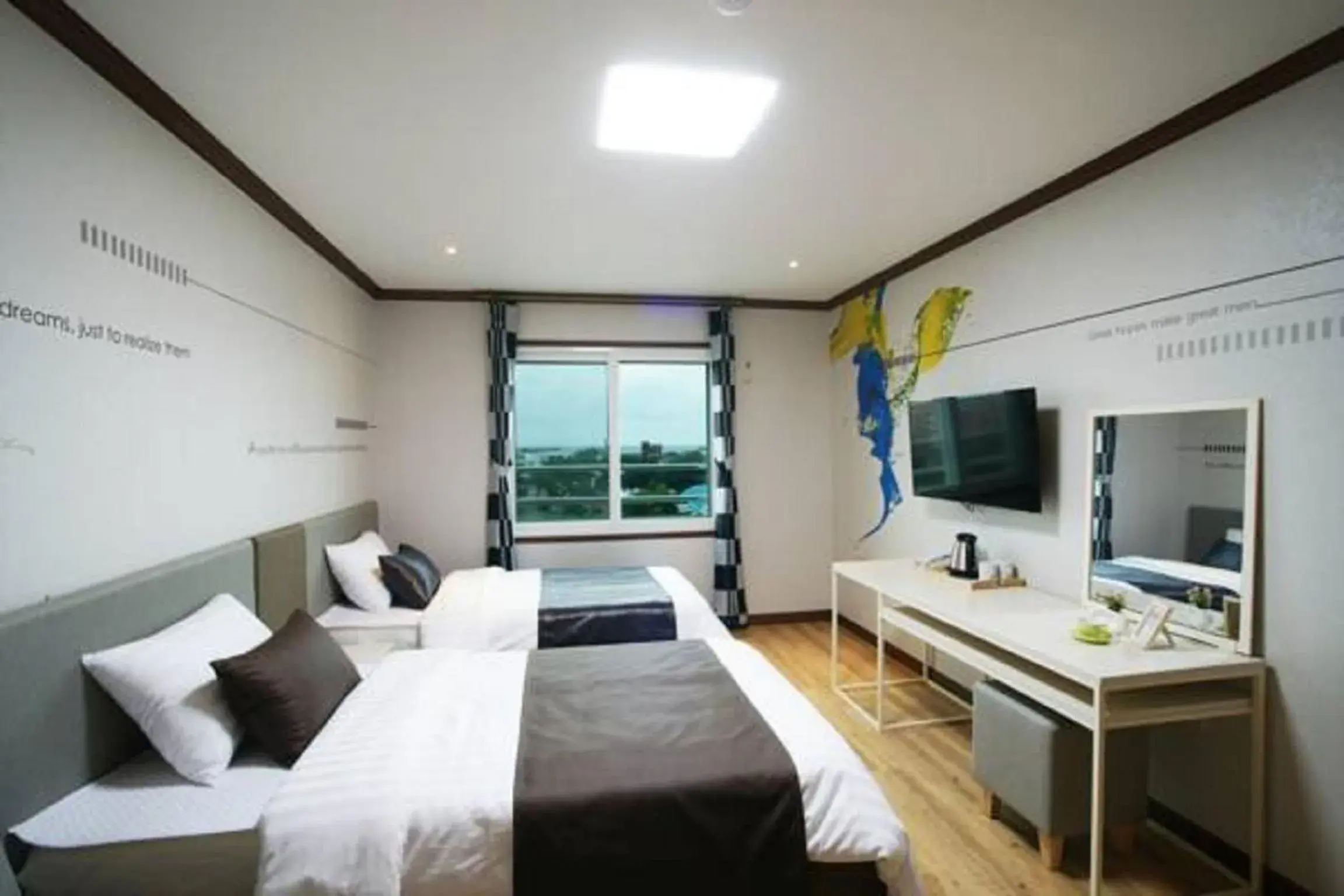 Bed in Seongsan Aqua Beach Hotel Bed in Seongsan Aqua Beach Hotel