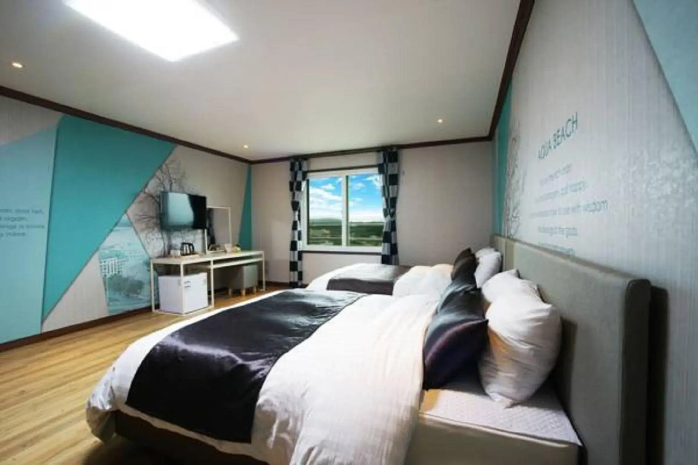 Bed in Seongsan Aqua Beach Hotel Bed in Seongsan Aqua Beach Hotel