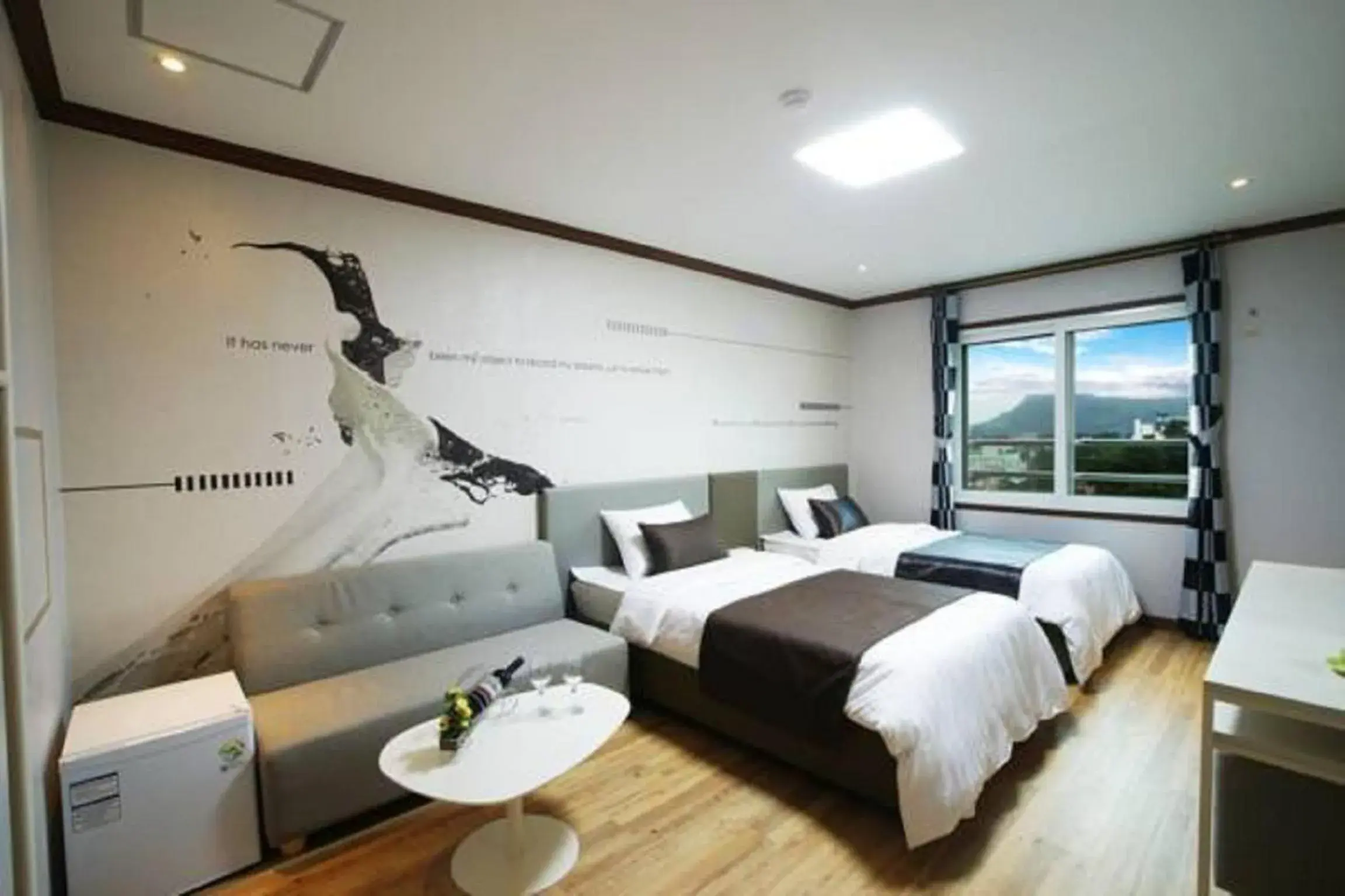 Bed in Seongsan Aqua Beach Hotel Bed in Seongsan Aqua Beach Hotel