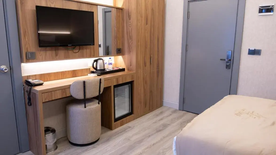 TV and multimedia, Bed in Optimal Hotel TV and multimedia, Bed in Optimal Hotel