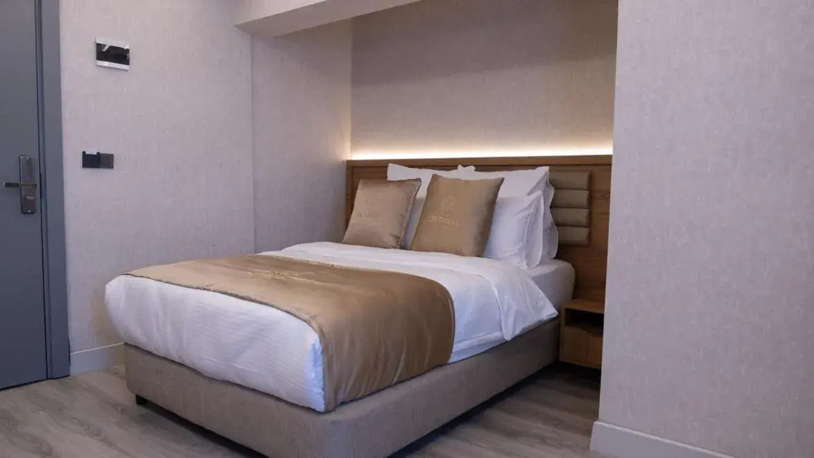 Bed in Optimal Hotel Bed in Optimal Hotel