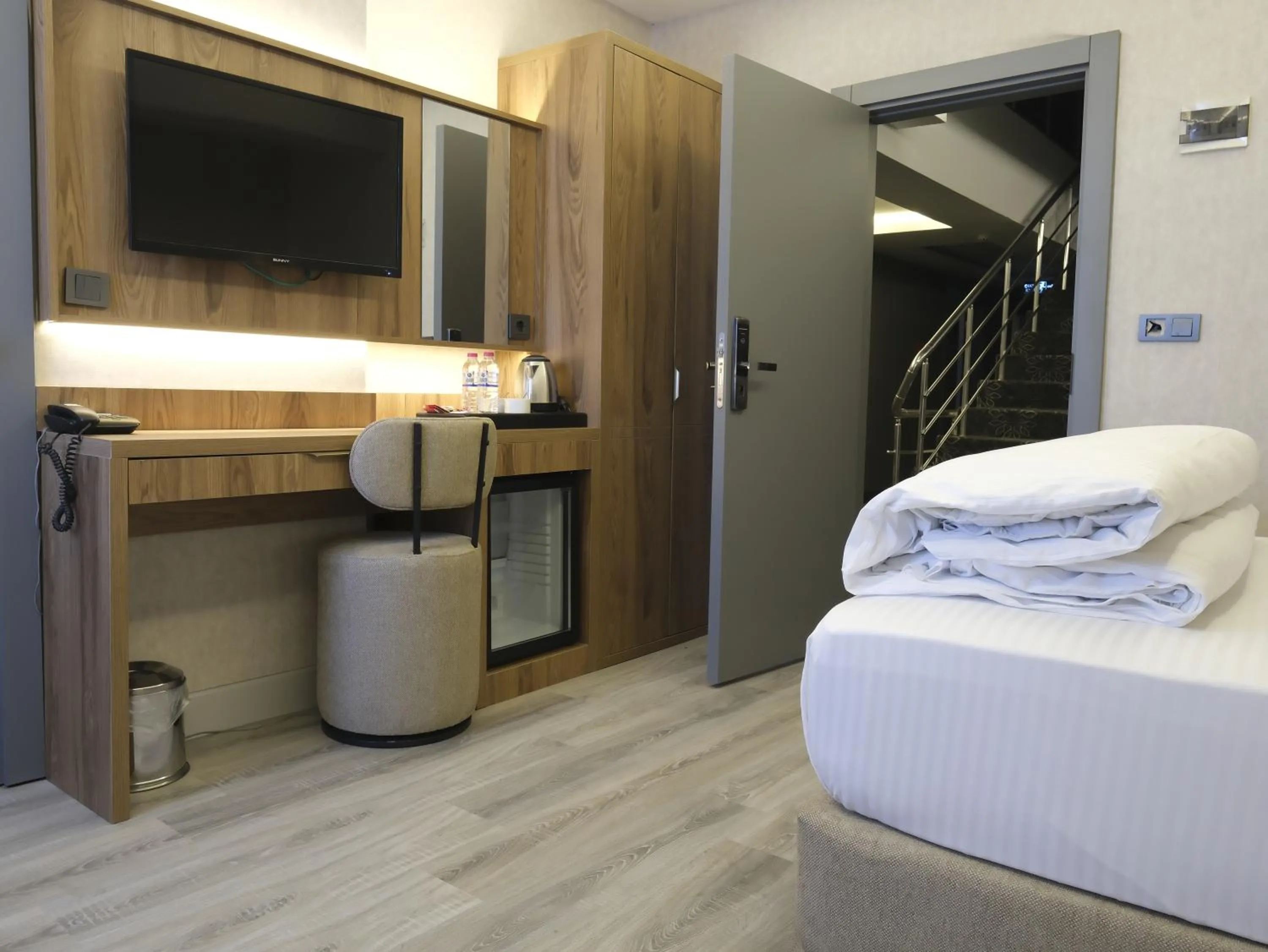 Bed in Optimal Hotel