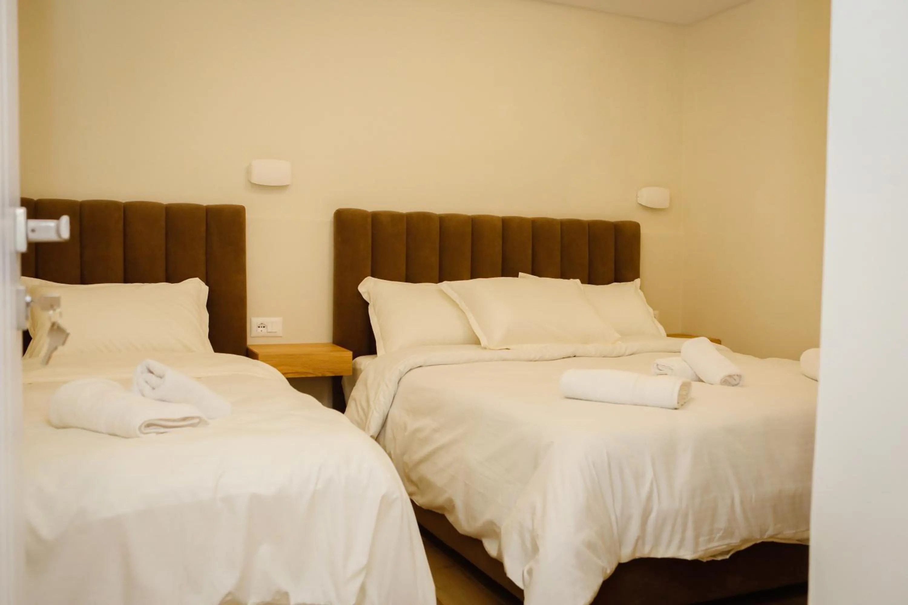 Deluxe Triple Room in Petite Maison Hermes Center