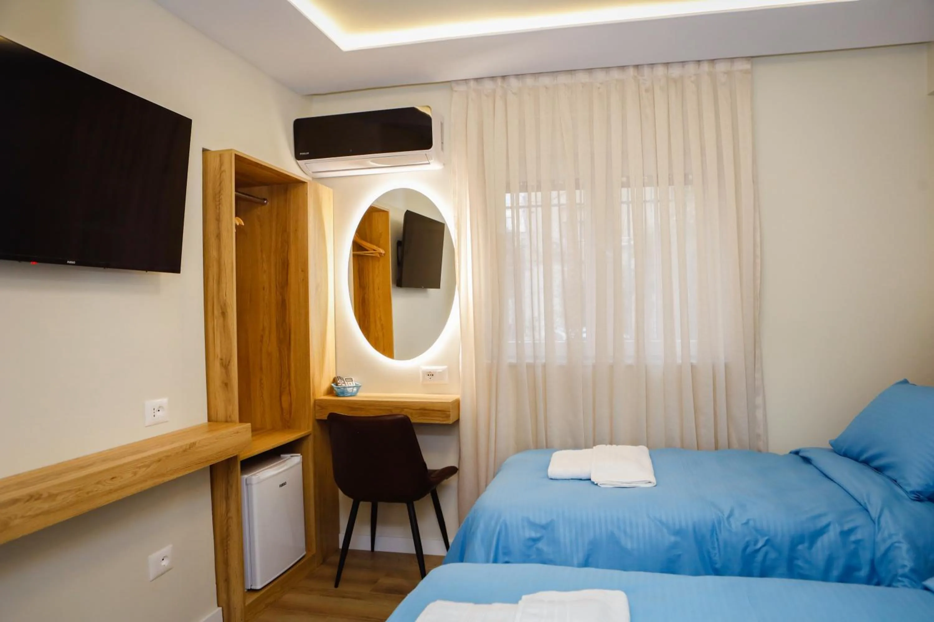 Twin Room in Petite Maison Hermes Center