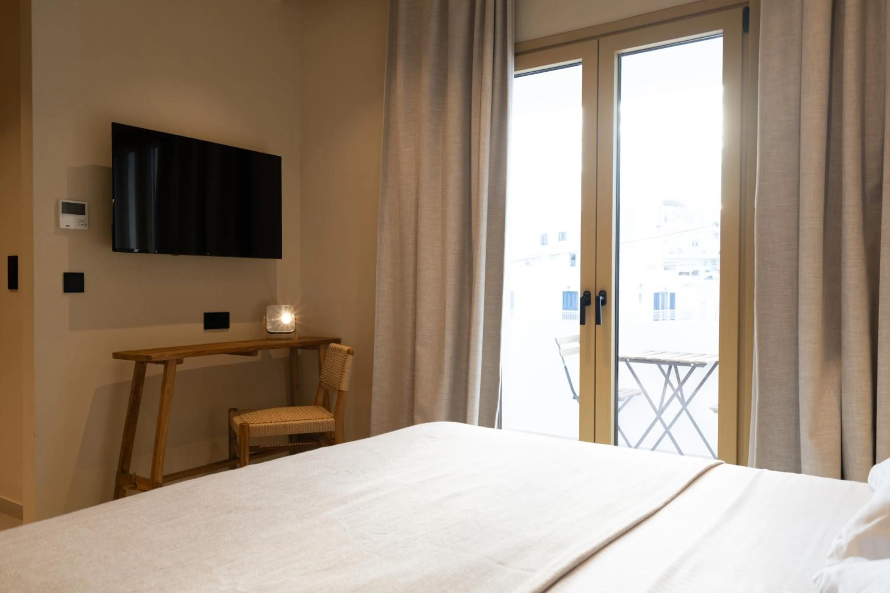 Bed in Portiani Suites