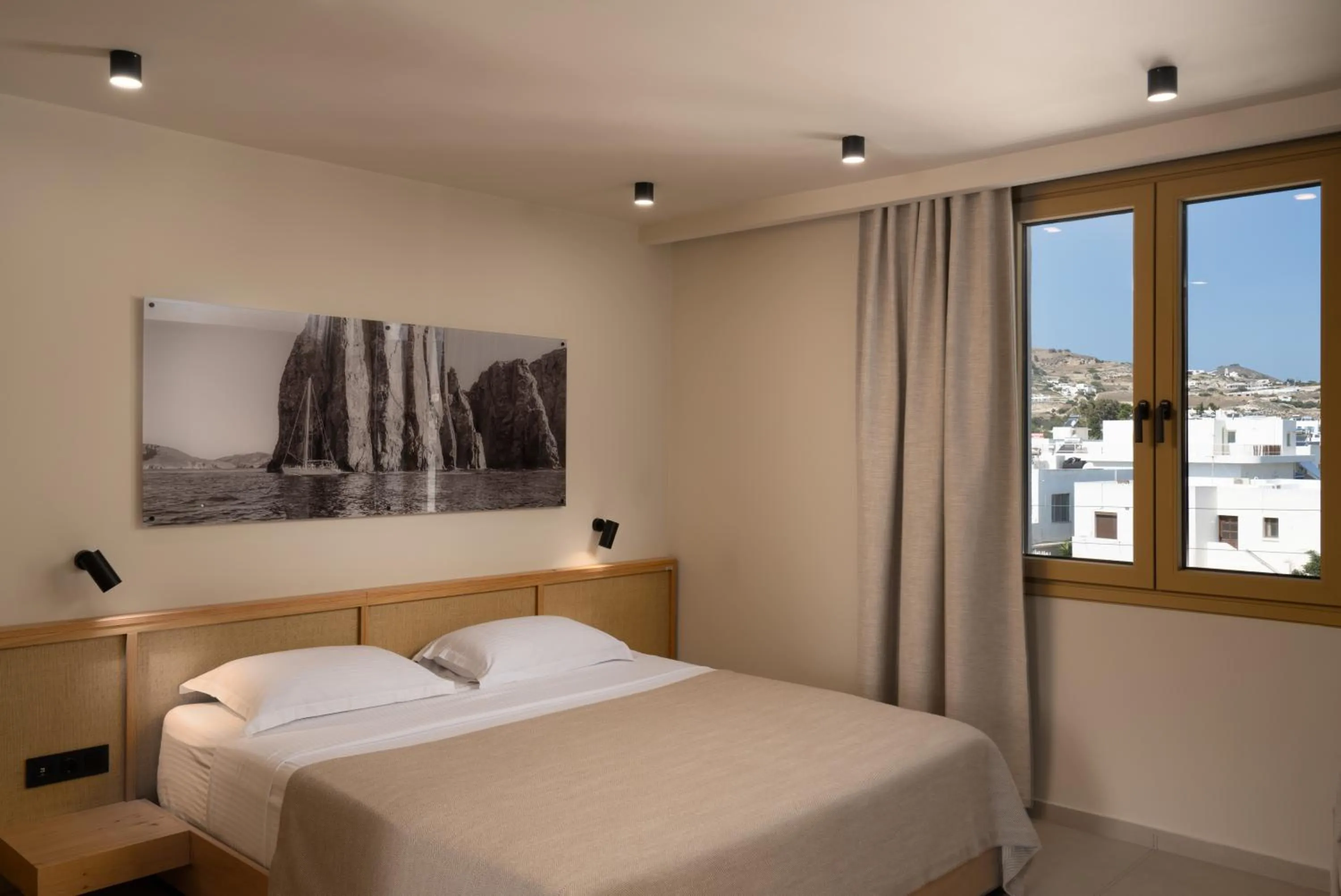 Bed in Portiani Suites