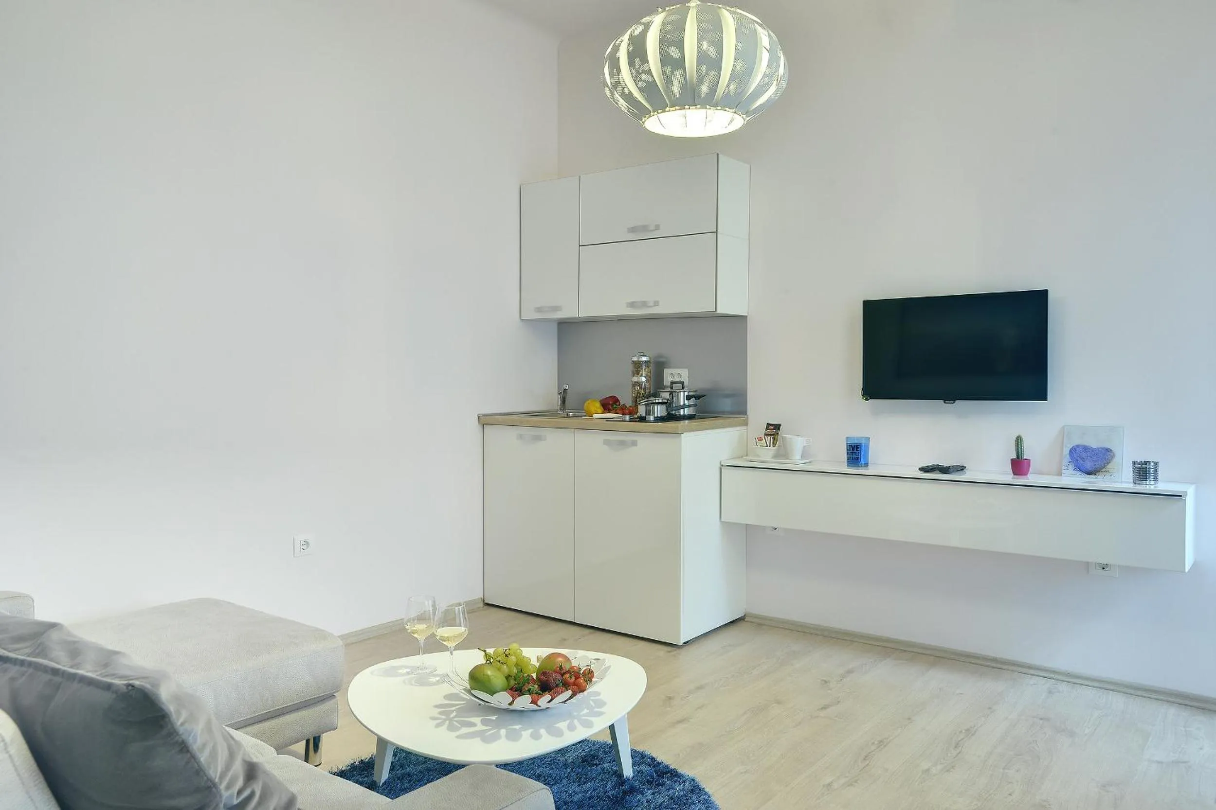 TV and multimedia in D&A Center Apartments with FREE Parking